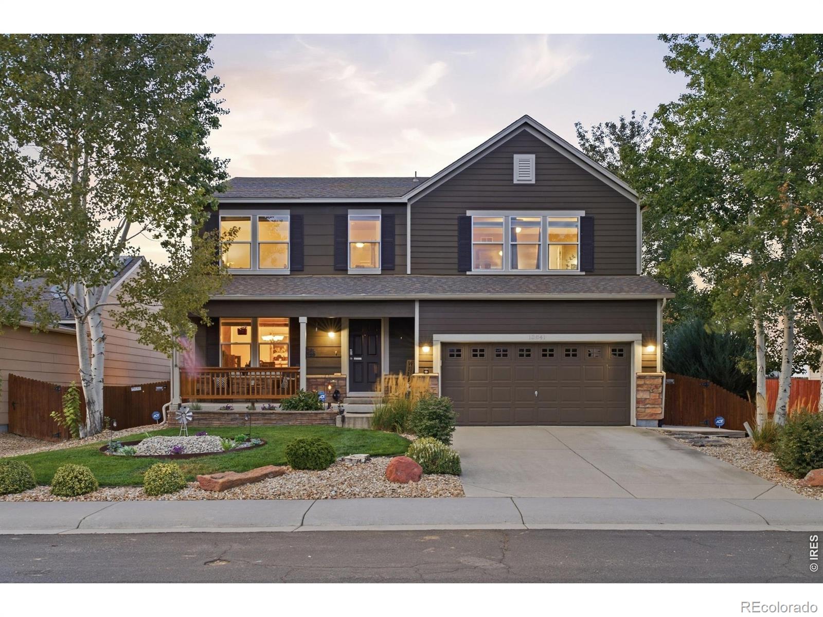 Welcome to 13841 Wrangler Way in Liberty Ranch that has been meticulously cared for and is ready for it's new owners! 3,754 finished square feet, four bedrooms plus a loft, and a basement that is actually used! The main floor is easy living. Living room and formal dining greet you first, then the kitchen with island and pantry opens to an eat-in space and a comfortable family room. Laundry and a powder bath sit complete the main floor. Wood floors in the kitchen wing; carpet in the living spaces. It feels like a house that has been cared for, because it has! Upstairs, the primary suite has a 3/4 bath with gorgeous walk-in shower and a large walk-in closet. Three more bedrooms, a loft that works as an office or hangout, and a full hall bath keep the rest of the floor simple and private. Downstairs is the fun. About 85% finished, with a fitness or flex room and a roughly 35-foot entertainment room with bar area. Unfinished storage, its own electrical panel, and three egresses. This space is ready for whatever entertaining or gathering you want to have! Then step outside. One direct neighbor. Private open space behind you. A greenbelt-style stretch to the side. Mountain views. A covered front porch, extra concrete patio, pergola, and a 13x24 covered rear deck with LED lighting, a ceiling fan, added privacy fencing, and 220 ready if you want a hot tub. This is the yard people stay home for. Sellers kept a dated list: radon mitigation 2019, sewer scoped 2020, toilets 2022, water heater 2022, furnace 2024, disposal and primary bath fixtures 2025, ducts cleaned 2026. Interior and exterior paint including deck and rails. LED lighting through most of the home, dimmers, updated window coverings, carpet on the basement stairs, and lifetime gutter protection on the house (transferable; rear deck excluded). A/C is 2017 and recently serviced. SVVSD schools. A short walk to the nearly complete new public library. This is a home you truly have to experience in person!