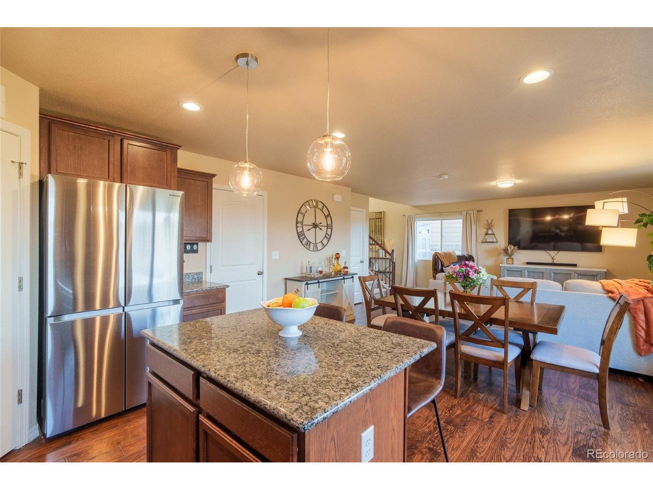 This home is smart from top to bottom and you'll feel it the second you walk in. The main level flows kitchen to dining to living on engineered hardwood, anchored by a granite island with pendant lighting and stainless appliances. Can lights were added in the dining area and upstairs hall. Nest thermostat, smart dimmers in every upstairs bedroom, motion-activated laundry switch, smart garage motor, and fan timers on every bath fan. Upstairs, the primary suite is the standout: a built-in window nook perfect for reading, custom board-and-batten accent wall, new ceiling fan, and a double-vanity en-suite. Half bath updated with new flooring, paint, mirror, and fixtures. 2023 roof. Furnace serviced, ducts cleaned, garage door springs replaced 2025. This home has been maintained, not just lived in.Bent Grass is inside the Woodmen Hills Metro District so your HOA includes access to two rec centers, pools, and a monthly water credit most neighborhoods don't offer. District 49 schools. Grocery under five minutes! The area is growing fast with Chick-fil-A and new dining and retail built or breaking ground minutes away. Powers Corridor 10 min, Peterson SFB about 15, Interquest about 20.What you won't get from the photos is this: the cul-de-sac lot backs to open space with no structures behind it. The yard slopes up for natural privacy, and at night the low light pollution means you can actually see the stars. The back patio is an every-evening spot for fires, sports, and quiet nights under open sky. Neighbors wave every time you drive by. There is one more thing about this home that makes it the best value on the market right now, but you have to see it in person. Ask your agent to schedule a showing!