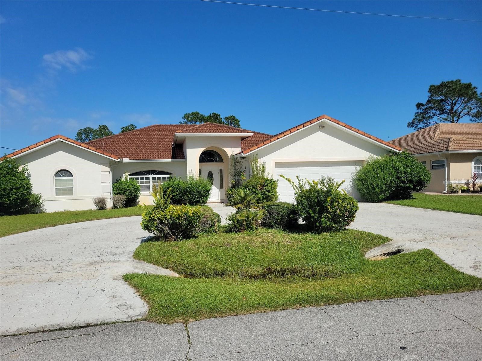 ****Listing will be updated with professional photos soon****Welcome to your ultimate Florida lifestyle at 11 Prince Walter Ln. This impeccably maintained 3-bedroom, 3-bathroom single-family pool home features a spacious, open-concept floor plan complete with vaulted ceilings, a formal living room, a formal dining area, and a bright family room. The chef-ready kitchen anchors the home with a massive center-island sink, breakfast bar, and sweeping views of the pool and lanai through large sliding glass doors.Designed with a smart split floor plan, the layout positions a private primary suite—complete with a full bath, water closet, and expansive walk-in closet—opposite two comfortable guest bedrooms and a shared full bathroom. Modern, high-quality laminate flooring warms the bedrooms, while easy-care tile spans the remaining living spaces.Step outside to a resort-style oasis. The large, fully screened lanai hosts a private in-ground swimming pool, a dedicated privacy fence, and a convenient third full bathroom. Beyond the enclosure, the fully fenced backyard offers absolute seclusion with dual-side gate access. Built to last, the home boasts durable block-and-stucco construction, a tile roof, gutters, a circular stamped concrete driveway, and mature landscaping. Major updates include a new water heater (2025) and HVAC system (2010).