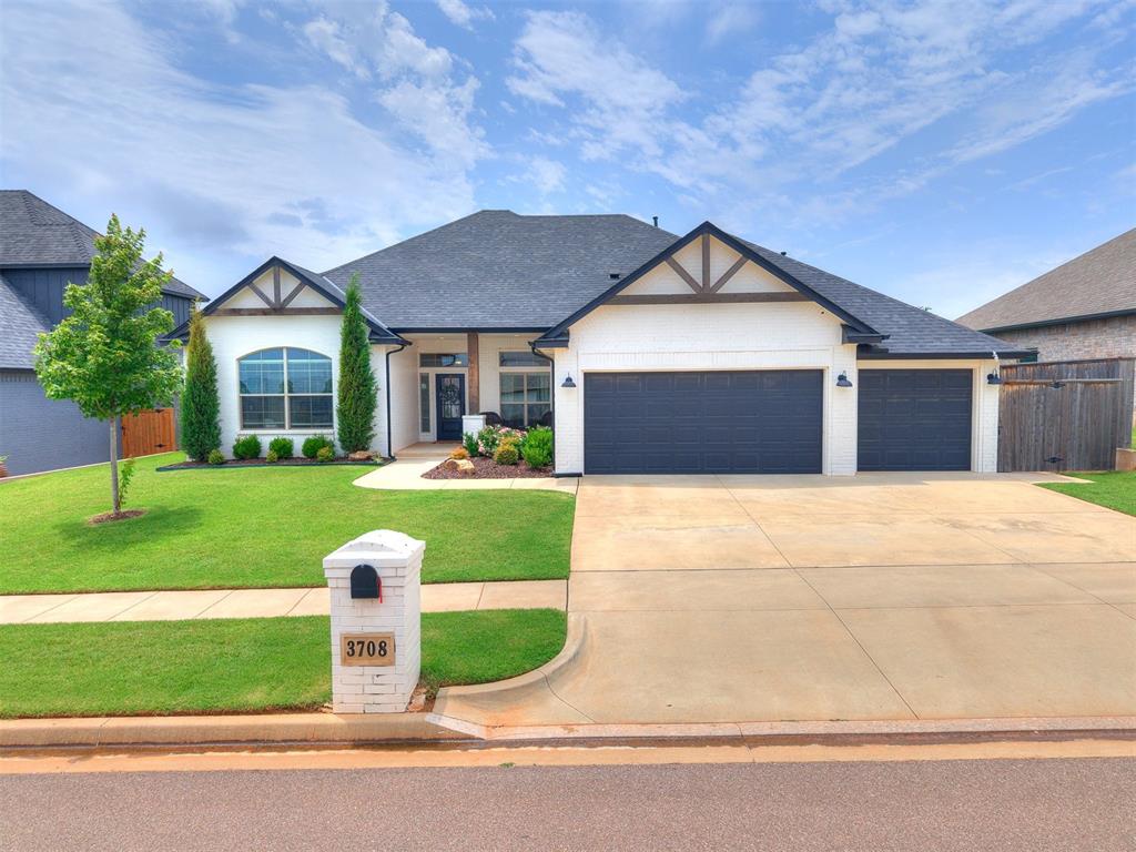 Step into this beautiful brick home that backs up to farm land! Enjoy space to spread out, with 4 very generous bedrooms and 2.5 bathrooms. The home is located in beautiful Vintage Creek Addition in northern Norman, just minutes from I-35 and the 24th Avenue shopping district. Starting the minute you pull up, the curb appeal couldn't be better. Fresh white painted brick paired with cedar beams gives this home a modern yet rustic flare. Stepping inside, the light and bright interior will have you immediately picturing your own things in the space. Such a fresh palette to move right in and decorate to your heart's content! The home features gorgeous hard wood floors and tile in all the high traffic spaces - such a dream for cleaning and maintenance. The gourmet kitchen features granite counter tops, built-in oven and microwave, separate gas range, center island, and a great corner pantry. You can really cook up a storm in here! The open floor plan means you can enjoy your family or guests and never feel cut off from the fun. The welcoming living room fireplace and huge flanking windows create a gorgeous focal point to enjoy from almost every sight line in the great room space. Double dining areas PLUS an eat at island, this home is an entertainer's dream. And that only gets sweeter when you move the fun out back to the spacious covered patio with a built-in fireplace and mounted TV that stays with the property. Tons of upgrades like dimmer switches in key areas, smart exterior lighting, smart sprinkler system, all cabinets have soft close hinges, under and above cabinet lighting in kitchen and office. To top it off, you can take your family and guests down to the neighborhood pool and clubhouse, to fish in the community pond, or to stroll the walking paths. You will not want to miss out on this opportunity!