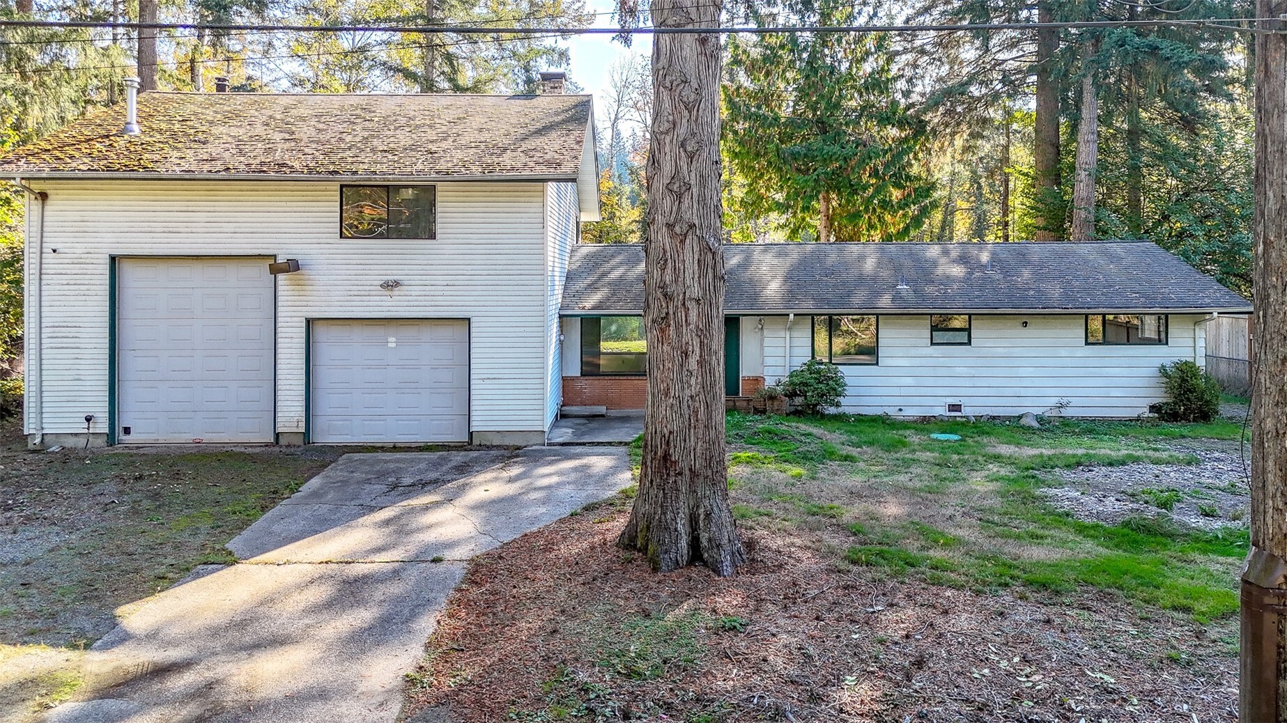 Amazing opportunity to finish what was started - Bring your vision! Rare riverfront property on the Cedar River in Maple Valley! Sitting on just under a third of an acre, this 2 bed + office/den, 1 bath rambler comes with a 1220 sq ft attached shop with a car lift, ready for the hobbyist, the car enthusiast, or anyone who needs serious workspace. Above the shop you’ll find a bonus room that could serve as a 3rd bedroom (seller has gotten an approved septic permit for 3 bedrooms), with potential to become an apartment or ADU (buyer to verify with King County). With single-level living, river frontage, and a shop this size, the bones are here to create your dream home. Properties like this on the Cedar river don’t come along often. Again - Bring your vision!