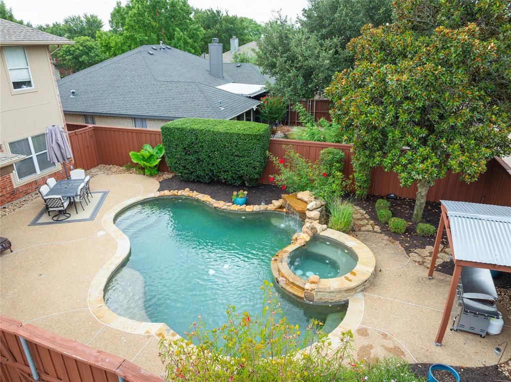 Rare find! Updated 2 story 4 bedroom home with a sparkling pool and spa in the perfect East Allen location! This open and bright floor plan features a spacious family room with corner fireplace. Updated island kitchen has rich granite counters, stainless steel appliances, gas cooktop and tons of storage. Second living area down could be game room or media room. Elegant formal dining area. Huge Primary Suite and luxurious bath with soaking tub and separate shower. 3 large secondary bedrooms and an additional full bath. Backyard oasis features a sparkling pool and spa, private covered patio, extended decking for entertaining and grilling area! Great location close to one of Allen's premier parks, schools and Allen's best shopping and dining!