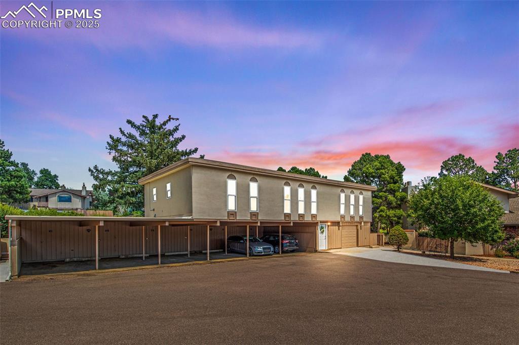 Welcome to a truly unique and versatile home in the prestigious gated community of Kissing Camels. This beautifully remodeled stand-alone condo offers the perfect setup for multi-generational living, with space, privacy, and flexibility all under one roof.

Originally built in 1969 and completely reimagined, this 3-bedroom, 2.5-bath residence features two fully separate living areas, each with its own full kitchen, laundry, and private entrance. There is also a shared entry, making it ideal for extended families, guests, or live-in support while still maintaining personal space and independence.

The home includes 1,748 square feet of well-designed living space. Upstairs you'll find light-filled rooms, updated finishes, and an open, welcoming layout. The main level offers a 1-car garage and ample storage area for a workshop, or area for hobbies. The possibilities are endless. Outside, enjoy a spacious deck that faces the mountains—perfect for relaxing or entertaining. Mature trees surround the property, offering a sense of privacy and tranquility.

Adjacent to the renowned Kissing Camels Golf Course, this one-of-a-kind home combines modern convenience with timeless charm in one of Colorado Springs’ most desirable neighborhoods.

Don't miss the opportunity to own a rare, stand-alone condo with a multi-generational floorplan in a secure, amenity-rich community.