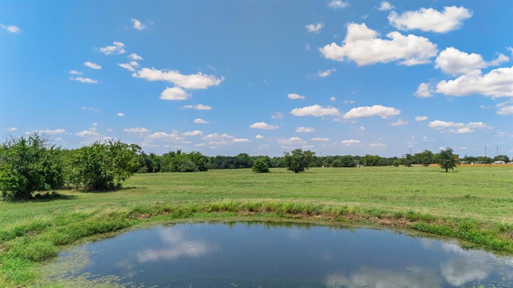 Pick your favorite hunting site on this 47 acres with Ag-Exemption just south of Interstate 30 in Cumby, Texas! Immaculately maintained, this scenic acreage comes with available water and electric (already on site) and lots of road frontage that can easily be subdivided into smaller tracts. High-speed internet is also available per seller. A wooded area provides a beautifully treed spot for that new home site! Two older septics are also on site. Fencing and cross-fencing allows you a secure place for livestock. Plus grassy pastures, 3 ponds, and a creek give you plenty of resources for animals. Stock the ponds with fish and viola'--you have the ideal place for all your weekend recreation or full-time living. You'll discover this idyllic place within commuting distance from Dallas. Located between the bustling small town of Sulphur Springs to the east and Greenville to the west, build your dream home in the country while being close to city amenities and a variety of community activities!