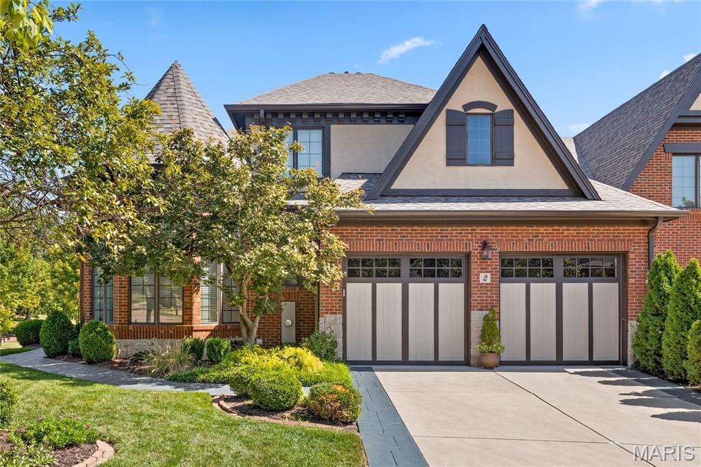 Spectacular 1.5-story villa in prestigious August Hill, offering classic styling, an open floor plan and exceptional spaces for both everyday living and entertaining. An impressive hardwood entry foyer opens to a private study with octagonal ceiling and a dramatic 2-story great room featuring a vaulted ceiling, stunning fireplace and full-height windows with arched transoms. The exceptionally spacious kitchen offers maple cabinetry, solid-surface countertops, premium appliances planning center, and adjoins a light-filled breakfast room with sliding glass doors opening to the private terrace. The main-level primary suite is an inviting retreat with a wide bay window, customized walk-in closet and luxurious bath with expanded shower. Upstairs, the living quarters continue with two additional bedroom suites and a versatile bonus room. The finished lower level provides outstanding additional living space with a huge recreation room with wet bar, billiards room and full bath. Additional highlights include a premium lot, private terrace and 3-car tandem garage.