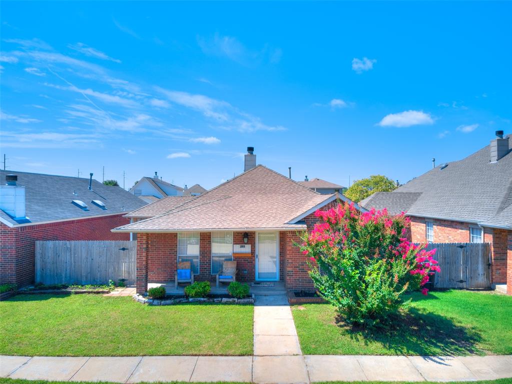 Seller is offering $3,500 towards buyer's closing costs! This adorable 2 bedroom/ 2 bathroom home is in Moore School District and is ready for its new owner. Upon entry you will note the high ceilings, fireplace and a built in bookshelf in the spacious living room. This area flows perfectly into the kitchen which has an island and ample counter space/ storage.  Both bedrooms are good size and the primary has an attached bath, a walk-in closet and its own enclosed patio! Easy maintenance yard and also a covered enclosed patio in the back yard. Schedule your showing today!