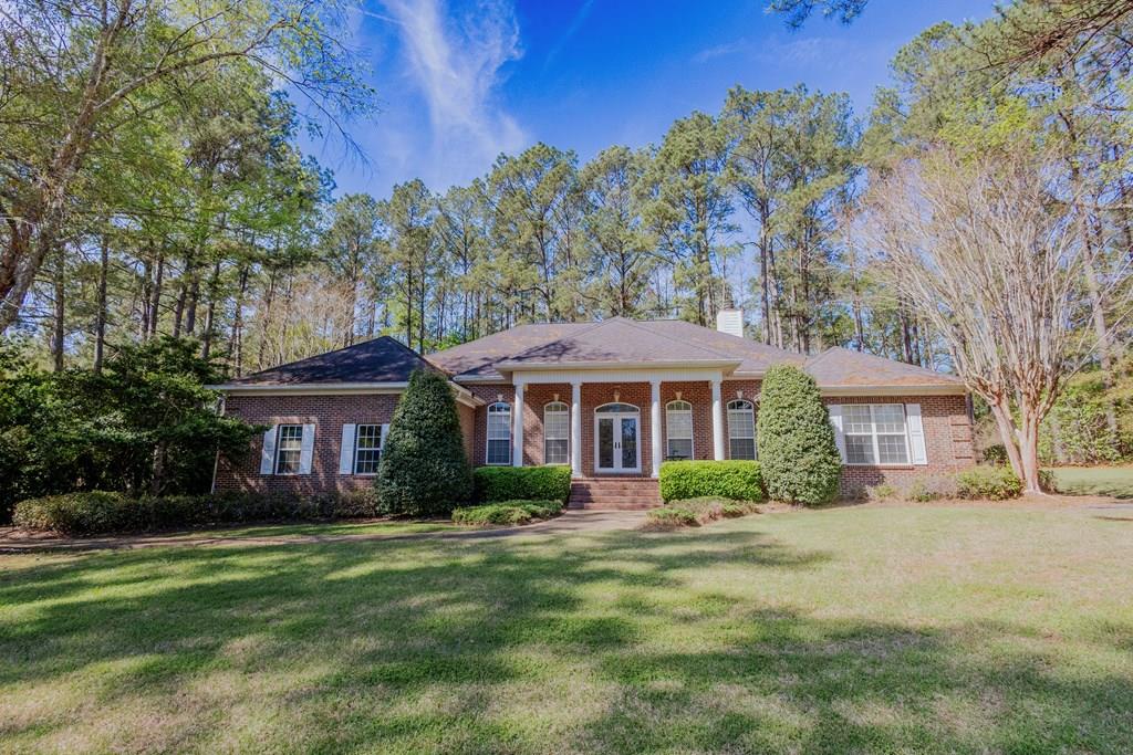 Great family home in A Place in the Woods subdivision located south of Thomasville. Brick quality built, all one story, features 4 bedrooms, 3 full baths and contains approx.. 3061 square feet on 1.34 acres. Open and spacious floorplan with entry foyer, formal living and dining room, large family room with high ceilings. Completely new kitchen including cabinets, lighting, appliances, and countertops. Split floorplan with 3 bedrooms and 2 baths on one side. Master is spacious with walk-in closet, double vanities, garden tub and separate shower. Nice laundry room, 2 car garage, covered back patio and large back yard. Outbuilding, community swimming pool and clubhouse. Call for an appointment.