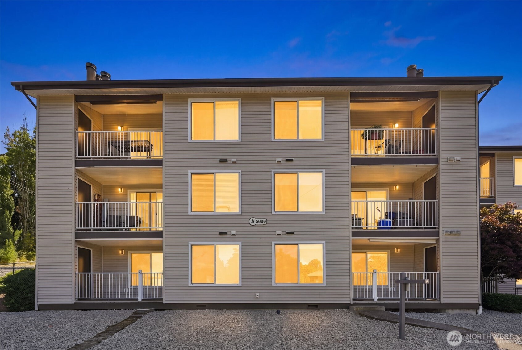 Spacious 1,016 SF ground-floor condo adjacent to Westwood Village! This move-in ready 2-bedroom, 1.75-bath home features a generous primary suite, open floor plan, hardwood flooring in the main living areas, wood-burning fireplace and in-unit laundry. Enjoy a covered deck with storage closet plus a 4' x 8' storage room and assigned covered parking. Convenient ground-floor access from both the street side and alley parking area. Pet-friendly community with RapidRide and public transit nearby. HOA dues include cable TV, internet, water, sewer, garbage, common area maintenance, lawn and road maintenance. Close to shopping, dining and everyday conveniences!