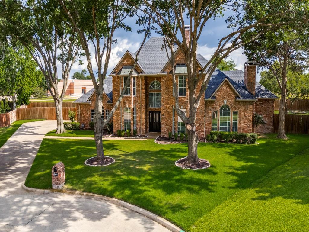 Nestled on a private, wooded cul-de-sac lot in one of Colleyville's most sought-after locations, this beautifully updated home offers the perfect blend of luxury, functionality, and connection to nature — with back fence access directly to OC Taylor Elementary's park + playground.Step inside to find a thoughtfully designed main level anchored by a spacious primary suite featuring a spa-inspired ensuite with jetted tub, oversized shower, separate vanities, and an expansive walk-in closet. A large private office impresses w a full wall of custom built-ins + an updated fireplace, while a charming bay window frames serene views of the wooded front yard.The heart of the home flows effortlessly between a generous family room w custom built-ins and a striking see-thru fireplace shared w the formal living room, plus a separate formal dining room for elegant entertaining.The beautifully updated kitchen is a true showstopper — featuring a large marble island w seating for 4-5 barstools, crisp white cabinetry w lighted upper cabinets, stainless appliances, + double convection ovens. A butler's pantry adds even more function w addt'l marble counters and cabinetry, while the casual dining area's bay window overlooks the backyard.Upstairs, three large bedrooms offer flexibility and comfort. Two bedrooms feature charming box window seats and share a convenient Jack-and-Jill bathroom, while the fourth bedroom boasts its own ensuite bath, accessible from both the bedroom and the hallway. A spacious gameroom plus a versatile loft area round out the second floor — perfect for movie nights, play space, or a secondary living area.Outside, the expansive backyard is an entertainer's dream with a covered patio and direct back fence access to the elementary school — a rare and coveted feature for families.  Addt'l highlights incl a 3-car, side-entry garage. ROOF 2024.This is luxury living with everyday walkability + wooded privacy — a truly special find in Colleyville.
