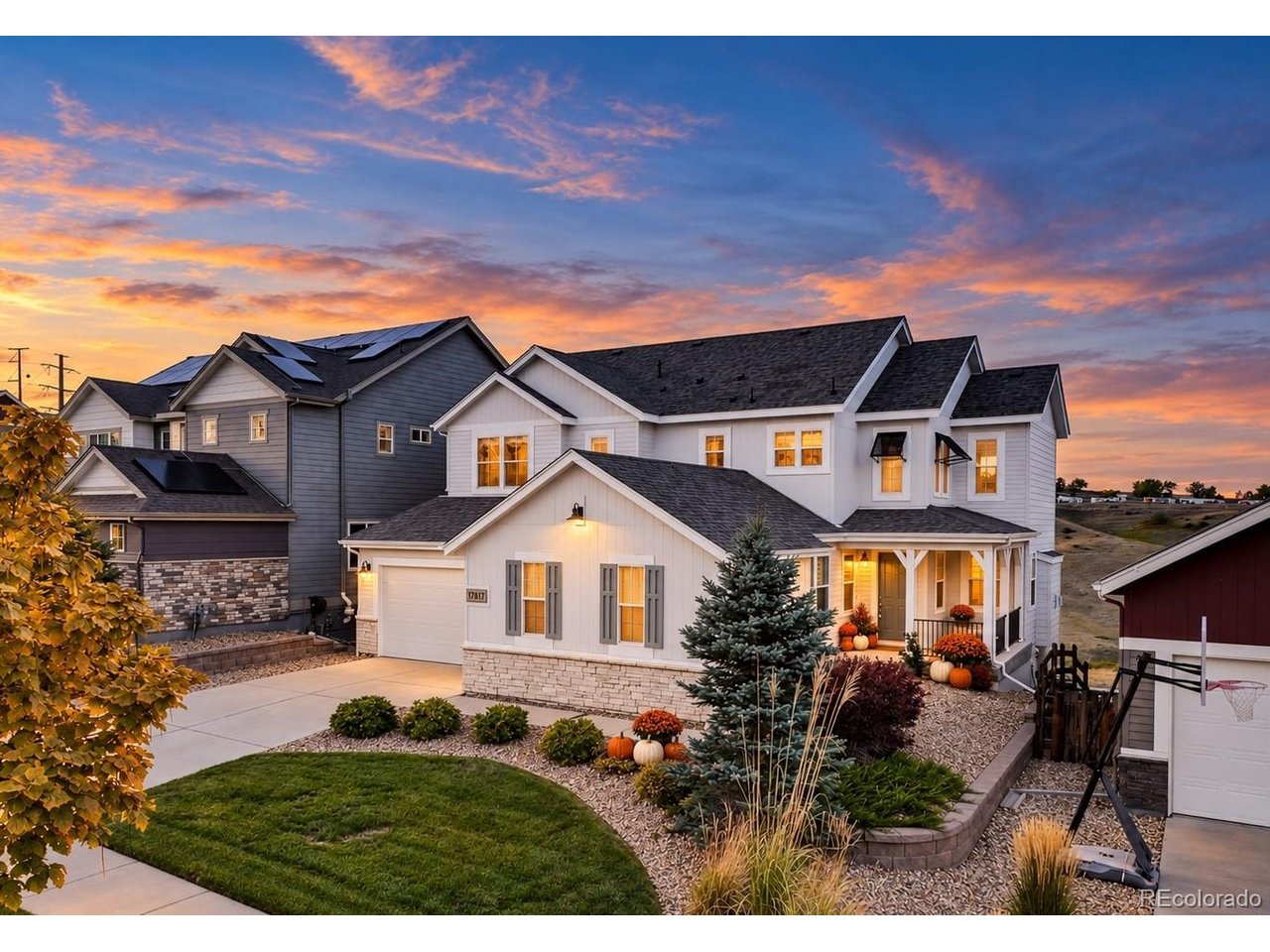 Luxurious 5 bedroom, 6 bath home with mountain views and a finished walkout basement! The photos do NOT do this home justice! Located in Leyden Rock, and designed for luxurious comfort, high-end finishes are found throughout. The expansive main level has views from nearly every window. The stunning great room opens to the incredible gourmet kitchen with oversized island, double ovens, gas range and walk-in pantry. The covered deck takes advantage of the mountain views and is a great spot for outdoor dining, relaxing and watching the sunset. A main-floor bedroom with ensuite bath is perfect for guests who prefer not to do stairs. The powder bath and roomy drop zone at owners entry add flexibility to the floor plan. Upstairs, the spacious primary suite includes a huge walk-in shower, dual vanities and walk-in closet. Two additional full bathrooms and bedrooms, a loft and sunny laundry room with utility sink complete the upper level. The finished walkout basement provides an amazing space. Featuring a large family room, fireplace, another bedroom and bathroom, and 2 storage areas. Step out into the no maintenance turf backyard and enjoy the view. There is no home directly behind the property, allowing for lovely open views. The oversized 3-car garage has 8-foot doors, additional storage and two 220V circuits for EV charging. Two separate high efficiency HVAC systems. There is truly too much to list here! Perfectly situated in Leyden Rock which offers a community pool, clubhouse, parks and miles of trails. K-8 students are bussed to Three Creeks K-8. An incredible neighborhood with convenient access to Arvada, Golden, Boulder and the foothills. A full pre-listing inspection was completed, including radon and sewer. See Supplemental attachments for the Pre-Inspection summary and line by line repair/updates documentation for all inspection items.