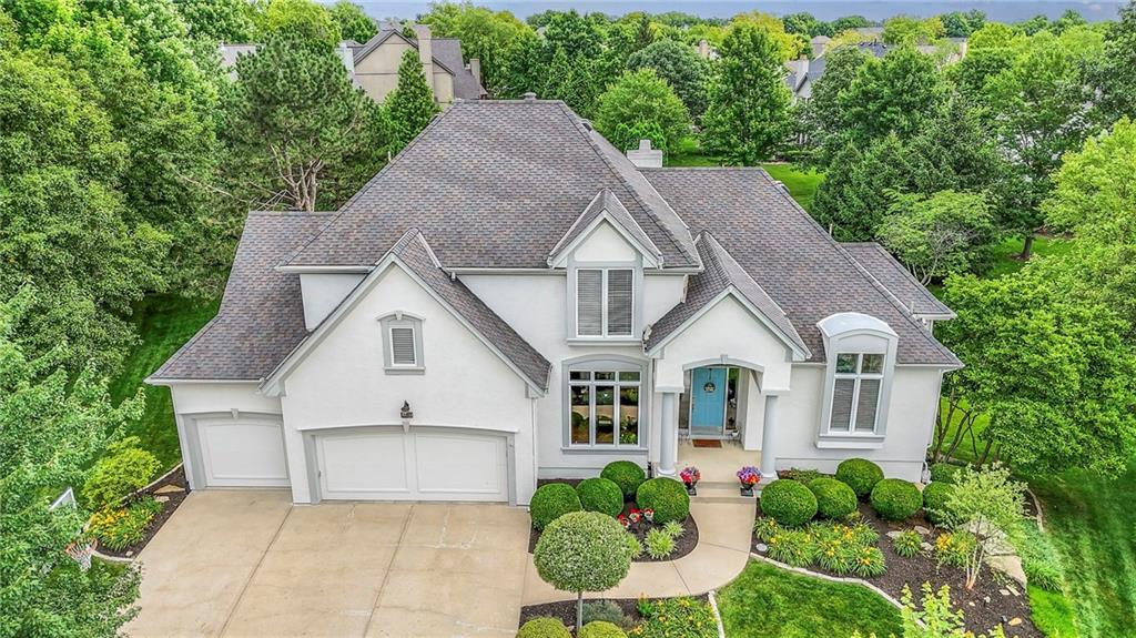 Rare 1.5 Story home in highly sought-after resort-style community of Cedar Creek-Southglen! Amazing cul-de-sac location on a LARGE lot with beautiful backyard views! Updated spacious home featuring a MAIN-LEVEL owner's suite including a spa-like bath with see-through fireplace, stand-alone claw foot tub, zero-entry shower and dual vanities. Main floor also boasts a large open kitchen with hearth room featuring a wall of windows overlooking an expansive backyard--sit and watch wildlife! Beautiful hardwood floors! Laundry room conveniently located off of the kitchen. The Formal Dining, Family Room and a Half Bath are also conveniently located on the main level. Upstairs you will find 3 more generous-sized bedrooms - all with walk-in-closets - and two additional bathrooms. The finished WALK-OUT lower level offers a large recreation room and HUGE storage areas! Outside you can unwind on your deck off the kitchen or the lower-level patio. Residents of Cedar Creek enjoy exclusive access to a 65-acre lake great for fishing, sailing, paddleboarding, kayaking and more, walking trails, tennis, basketball and pickleball courts, THREE pools, clubhouse, exercise room and event spaces. Neighborhood elementary school and pool just blocks away! Don't miss out on this one!