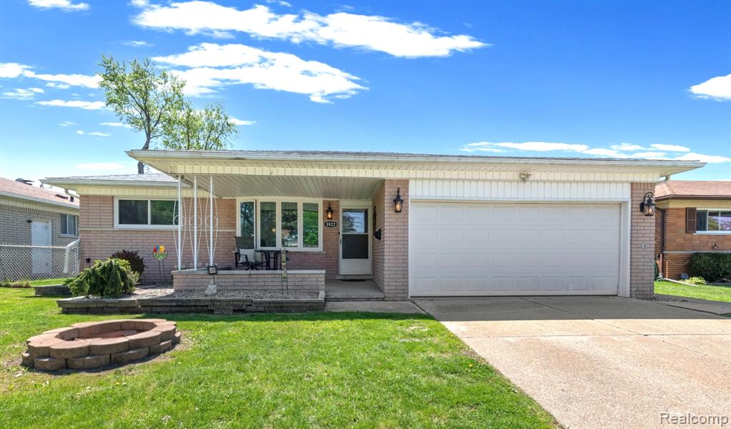 Welcome to this 4-bedroom, 2.5 bath light-filled home that offers a versatile layout, beautiful updates, and an incredible amount of finished living space throughout. The open concept kitchen/dining/family room creates a warm heart of the home for both everyday living and entertaining. The kitchen features granite countertops with plenty of prep space, a peninsula, and great cabinet flow. Cozy up and relax by the natural woodburning fireplace. Beautiful crown molding extends throughout the home, including in the finished basement, adding a polished and elevated feel to each room. The fully finished basement offers exceptional additional living space, a full bathroom, abundant storage, and an egress window providing extra natural light and safety. One of the main floor bedrooms was previously utilized as a first-floor laundry/dressing room, however, the room can easily be converted back into a traditional bedroom if desired, as there is a second laundry area available in the basement.Major updates include a new furnace in 2020, new central air conditioning in 2021, all new appliances in 2021, new hot water heater in 2022, and new energy efficient windows throughout the entire home in 2021, including a spacious garden window in the kitchen and an elegant four-panel bow window in the living room. The windows come with a lifetime fully transferrable warranty for the new homeowner.Step outside to enjoy the backyard featuring a large cement patio, professionally installed fire pit, flowerbeds, cement sidewalks, and a cement shed pad already in place and ready for a storage shed. This home is conveniently located just down the block from Beer Middle School and a short half mile walk through the neighborhood to Warren Mott High School. This is a home that truly offers warmth, space, flexibility, storage, and pride of ownership throughout.