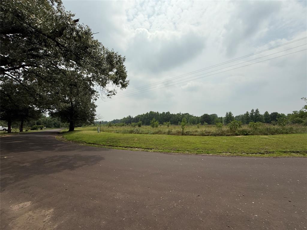 Design your house and build it among the trees on this wooded 16-acre sanctuary that has some pasture! Located near Como, Texas, this long strip of land can be also be subdivided into smaller tracts. You'll find approximately 310 feet of road frontage on the north side and approximately 560 feet on the east side. Buyer will need to verify availability of water and electric power. No FEMA (floodplains) or pipelines come with this land. An abundance of trees provides extra layers of privacy for a new homesite. Keep it all and raise some livestock on the pasture or take out what you need and resell the rest. Lots of potential for a home site, homesteading, hunting tract, investment, or all the above!
