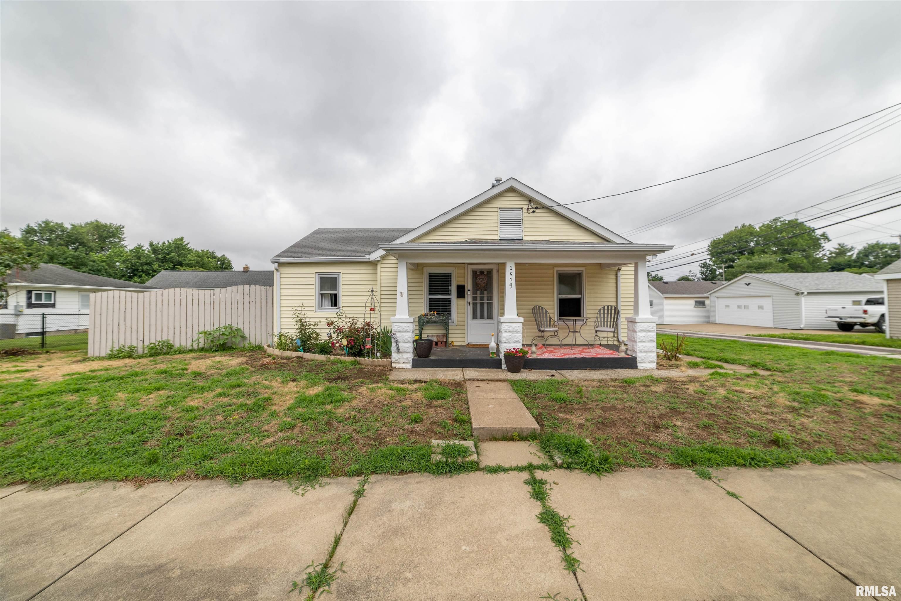 Cute as a button and move-in ready! This well-maintained 2-bedroom home offers numerous updates throughout, including updated flooring, fresh paint, an updated electrical panel, and a refrigerator new in 2026. The bright back sunroom features updated vinyl windows, creating the perfect space to relax, enjoy your morning coffee, or simply take in the view of the backyard.  The basement is currently being utilized as a craft room, providing valuable additional living space and flexibility for hobbies, a family room, home office, or workout area. Outside, you'll appreciate the deep 1-car garage that includes a separate workshop area in the rear—perfect for projects, storage, or creating your own workspace.  Affordable homeownership opportunity with monthly payments that may be cheaper than rent for qualified buyers. Whether you're a first-time homebuyer, downsizing, or looking for an investment property, this home offers comfort, functionality, and value. Priced to sell and ready for its next owner!