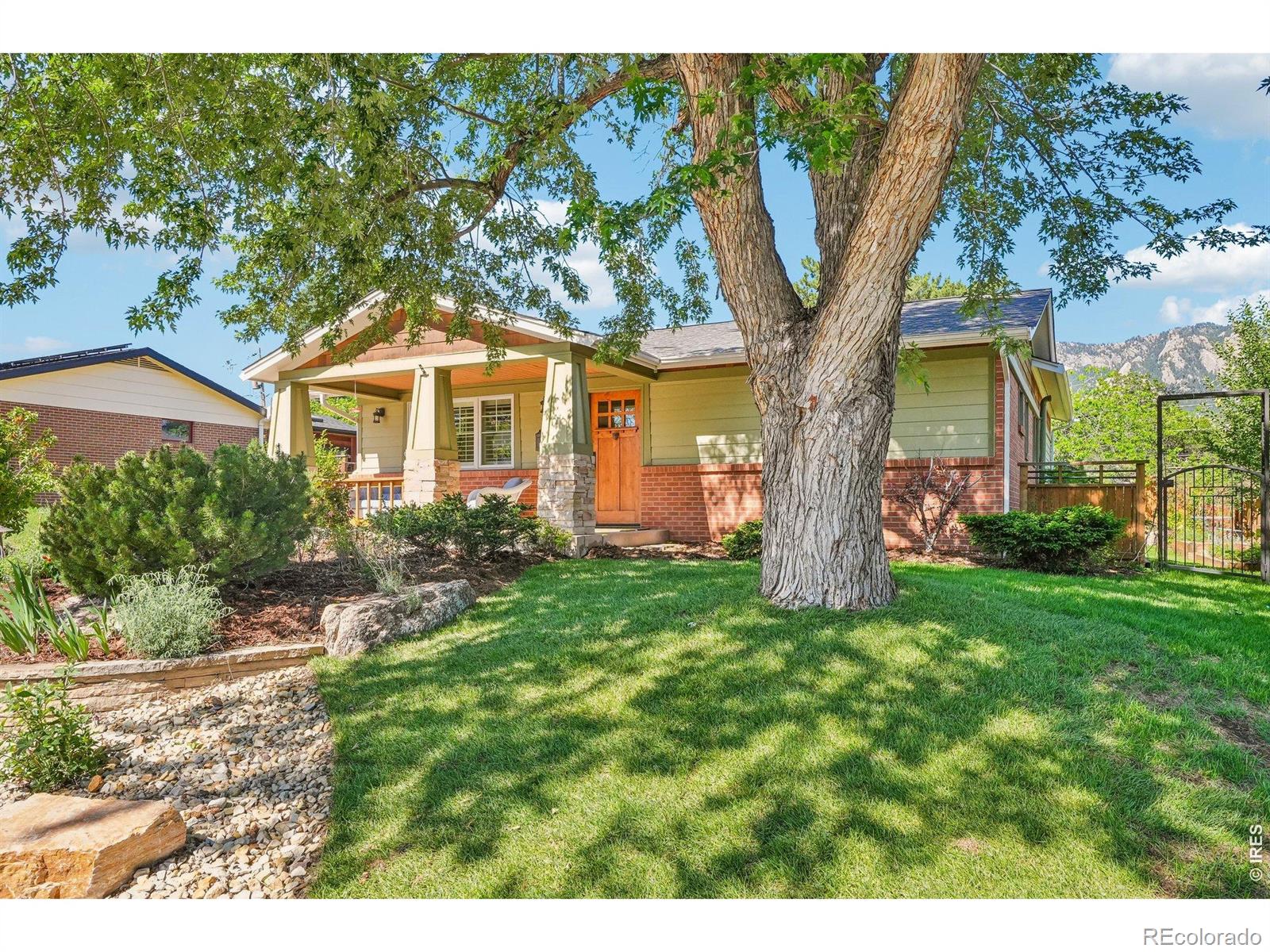 Nestled in the heart of Table Mesa, this fully reimagined residence is a masterwork of Craftsman architecture.Originally redesigned by the nationally acclaimed Knudson-Gloss Architects&executed by Silver Lining Builders, this 2,200-sqft home perfectly balances high-end luxury w/sustainable,modern living.From the moment you approach the stone pillars&expansive front porch,it's clear this is a home built w/intention and soul.Inside,the craftsmanship is 2nd to none. Beamed ceilings soar over rich oak flrs, while custom knotty alder doors& cabinetry provide a warmth that flows throughout the 4 BD/3 BA layout.Bathed in natural light thanks to a thoughtful south-facing design& premium Pella windows finished w/custom plantation shutters. Whether you're cozying up by one of the 3 gas FPs or admiring the artisan iron railings&granite countertops,the open floor plan feels both sophisticated&inviting.The main level offers the convenience of a true primary retreat,featuring an expansive walk-in closet&spa-like BA,complete w/dbl sinks, beautifully tiled walk-in shower,&heated tile flr. A 2nd BR,full BA,&dedicated laundry room round out the main floor.The finished lower level features a spacious 2nd family rm&2 additional BRs w/full BA.Egress windows ensure the space is bright&airy,perfect for a home office or a guest wing.Practicality is woven into the luxury w/a whole-house vacuum&owned solar PV system.The exterior is an entertainer's dream& gardener's sanctuary. Meticulously maintained,the grounds feature custom hardscaping,flagstone patio&tranquil pond w/cascading waterfall. Raised garden beds are ready for your harvest, supported by a 10-zone irrigation sys&framed by elegant LED lighting. The property is fully enclosed with cedar fencing&custom iron gates, leading to a 2.5-car det.GAR&custom driveway.Just steps from Viele Lake,S.Boulder Rec Center,&iconic Mesa Trail system.Experience the pinnacle of Boulder living in a home where every detail has been executed to perfection.