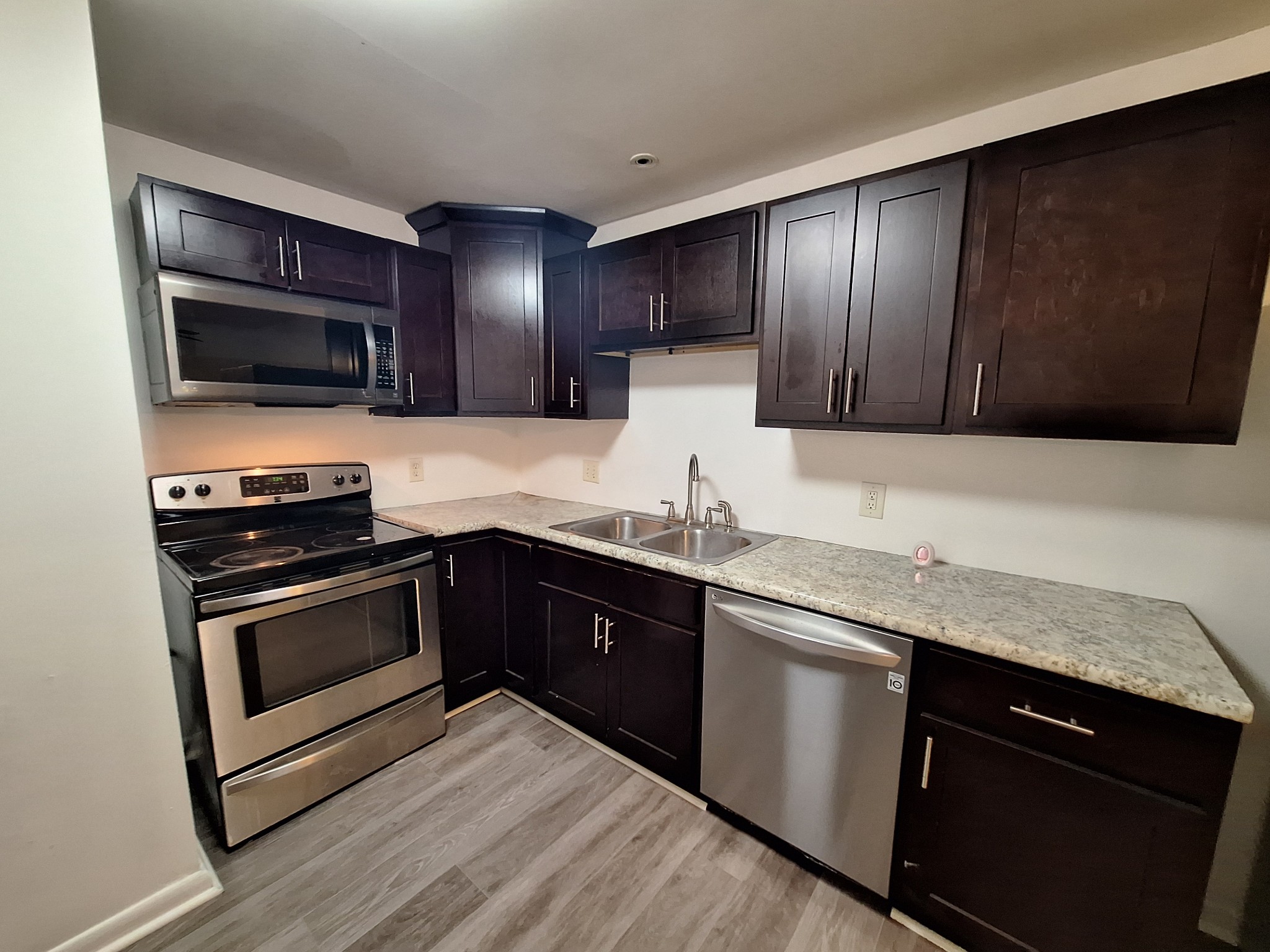 Updated One Level - Ground Floor Condo!   All new flooring, paint and kitchen remodel.  HOA fees  include water bill and grounds maintenance.  This home is perfect for a small family or add this condo to your investment portfolio.  2-bedrooms, 1 full bathrooms, washer, dryer and refrigerator makes this condo a perfect home yet priced just right.   Madison Park Condominiums are located across the street and offers tons of green space, Madison Community Center and the Park, play ground and ball courts.  Convenient access to Downtown Nashville and East Nashville.  A designated parking spot plus ample guest parking.  Call today for a private showing.  At this price, this condo will not last.