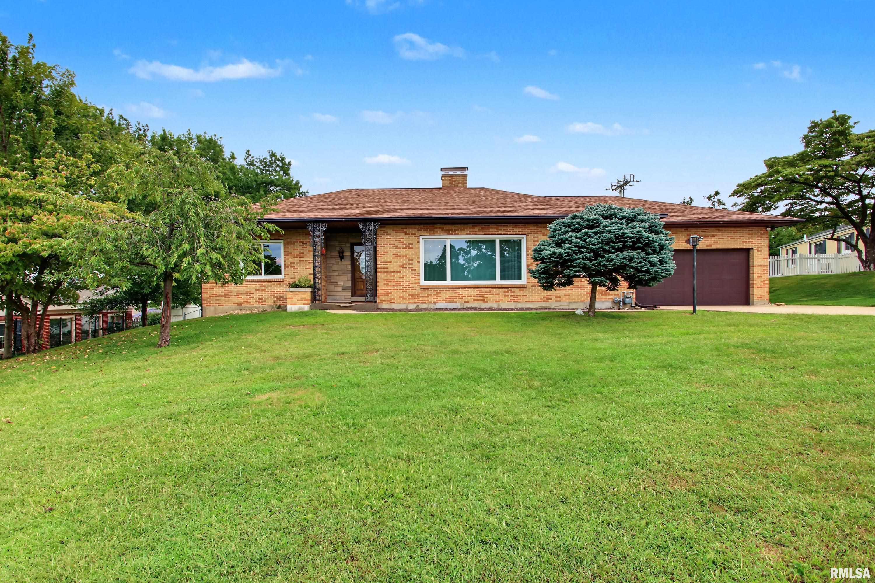 Welcome to this spacious 3-bedroom, 2-bath ranch tucked away on a cul-de-sac in a convenient central location! With over 2,200 sq. ft. of living space, this home features an updated kitchen, three fireplaces and a primary suite with vaulted ceilings and a private bath. The partially finished basement provides additional living space, while the attached 2-car garage adds everyday convenience. Outside, enjoy the large lot and backyard patio, offering plenty of space to relax, entertain or enjoy the outdoors. With a great combination of space, updates and location, this home has so much to offer! *Some photos have been virtually staged to help illustrate the potential use of the space. Virtually staged images may include digitally added furnishings and décor for visualization purposes only.