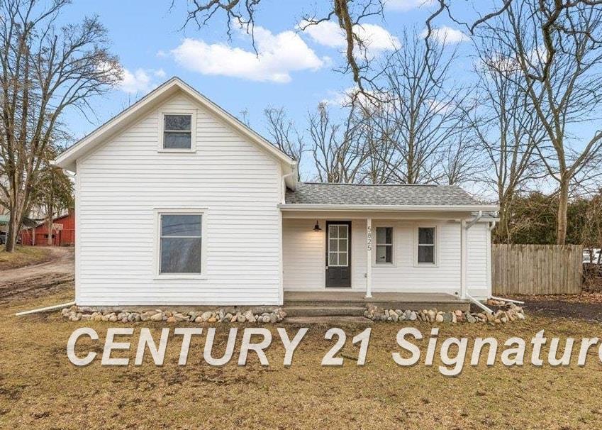 Beautifully preserved and thoughtfully renovated down to the studs, this stunning farmhouse blends timeless character with modern comfort. Offering 2 bedrooms and 2 1/2 baths, every detail has been carefully updated while maintaining its original charm. Rich wood floors flow throughout the home, adding warmth and continuity to the light-filled living spaces. The light-filled living room flows seamlessly into the kitchen, creating an inviting open-concept layout perfect for everyday living and entertaining. The kitchen features quartz countertops, stainless steel appliances, and a dedicated eating area that overlooks the backyard. Convenient first-floor laundry adds to the home's practical appeal. The primary suite is a private retreat, complete with a walk-in shower and direct access to the screened porch - the perfect spot to enjoy your morning coffee or unwind in the evening. A second bedroom and additional full bath upstairs provide flexibility for guests or a home office. Outside, the covered front porch offers classic farmhouse charm, while the expansive backyard presents endless possibilities for gardening, play, or entertaining. A patio and storage shed add function and versatility to this generous outdoor space. Move-in ready and beautifully updated, this home offers the perfect blend of historic character and modern living. Brand new electrical, HVAC, plumbing, windows, doors and so much more! Roof 2022. 6" foam insulation on all exterior walls and roof.