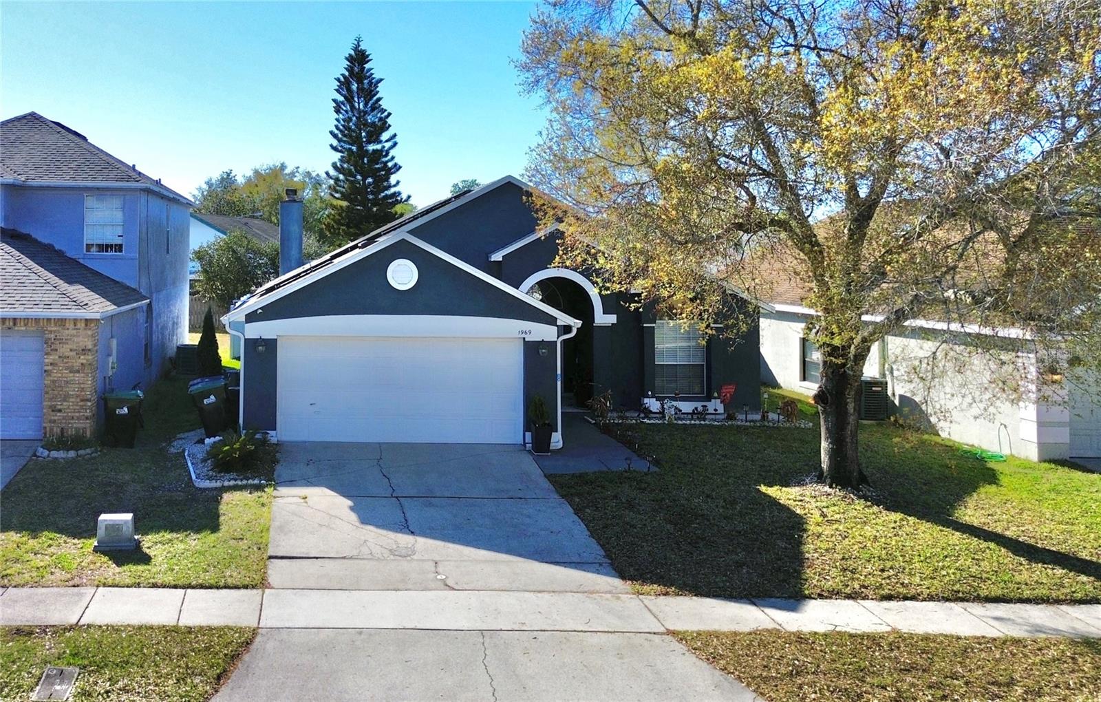 THE ULTIMATE ENERGY-EFFICIENT OASIS IN RIVER PARK! Prepare to be impressed by this meticulously maintained 3-bedroom, 2-bathroom pool home that combines modern luxury with unprecedented monthly savings. This is a rare "unicorn" in the Orlando market: SOLAR PANELS WILL BE PAID IN FULL AT CLOSING, It covers current Electrical consumption of the home's electricity—including the pool motor. Tesla owners rejoice with a dedicated built-in Tesla charger in the garage, making this the most tech-forward home in the area.UNBEATABLE UPGRADES & PEACE OF MIND: This home is truly "turn-key" with all major systems updated for maximum insurance discounts and longevity:NEW ROOF (2023) and UPDATED PLUMBING throughout the entire house.Elegant Remodeled Kitchen and Bathrooms featuring premium finishes.Spacious open floor plan with Cathedral Ceilings, skylights, and a cozy fireplace that fills the home with natural light.Brand new Samsung Washer & Dryer and Custom Wood Closets (2023) in the primary suite.Fresh interior paint and beautiful tile/wood flooring throughout—no carpet here!.YOUR PRIVATE OUTDOOR SANCTUARY: Step outside to a backyard designed for Florida living. The screened-in pool was recently resurfaced and is surrounded by new brick pavers and a massive custom Gazebo, perfect for weekend BBQs. The entire property is secured by a new PVC privacy fence and an advanced ADT alarm system.PRIME LOCATION: Nestled in the quiet, friendly community of River Park, you are strategically located just 15 minutes from UCF, with immediate access to Colonial Dr, Downtown Orlando, and the Airport.ACT FAST: The seller has a high sense of urgency and this home is priced to sell immediately. Properties with these upgrades and ZERO electric bill are non-existent in this market. Schedule your private showing today and submit your showing before this gem is GONE!