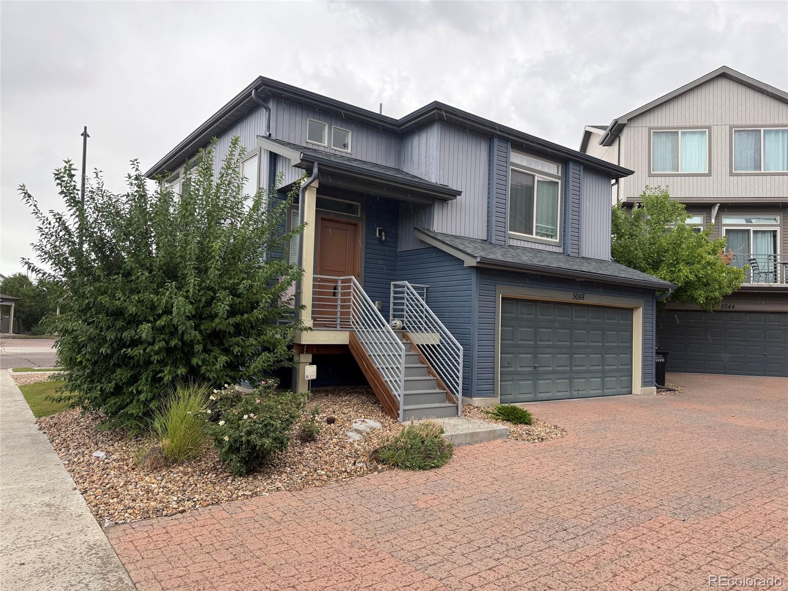 Great Location.  Easy access to shopping and DIA.  This home has a lot of windows that provide a ton of natural light.  The kitchen island is great for entertaining.  The family room in the basement could be converted into a 3rd bedroom.