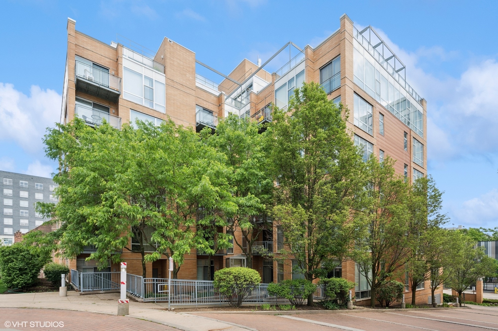 Discover this fantastic, freshly painted ground-level condo in the sought-after Sienna complex. Featuring floor-to-ceiling windows, hardwood floors in the main living area, granite countertops, and a rare private fenced patio. The unique bedroom layout features an overhead pass-through light and a spacious walk-in closet. In addition to the walk-in closet, the unit features two generously sized closets and a separate, assigned storage space located down the hall from the unit. Enjoy the convenience of full-sized in-unit laundry, heated garage parking, and access to the building's exercise room. Just steps from the Metra, CTA, restaurants, shops, movie theater, library, Lake Michigan, and Northwestern Campus. Note: New owners must occupy the property for one year before renting. A perfect blend of comfort and location-welcome home!