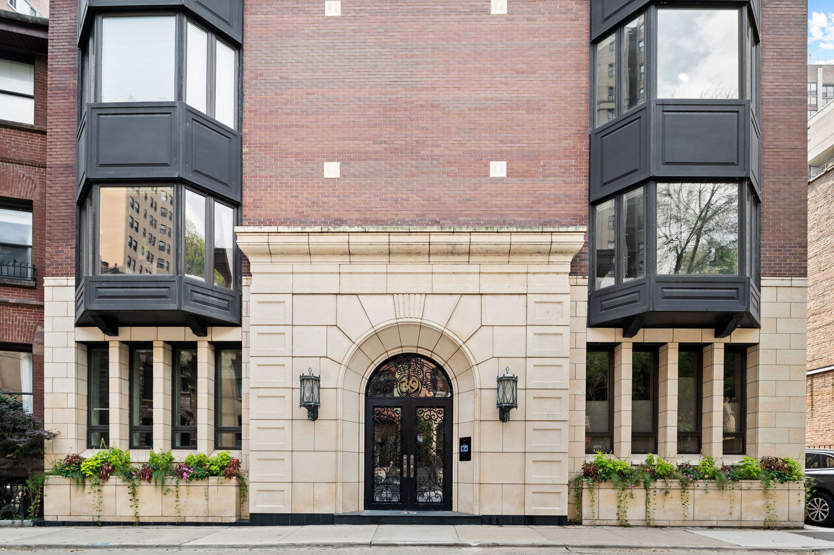 If you're looking for a little drama, this Gold Coast penthouse delivers-complete with a private rooftop terrace, soaring ceilings, and light-filled design that rises above the rest.  This glamorous 4BD/3.5BA duplex penthouse offers two additional balconies and a boutique elevator building setting just blocks from the boutiques and dining along State, Rush, and Oak Streets. A shared parking pad provides convenience for drop-offs or service access.  The home was refreshed and restyled in 2020 and has been impeccably maintained. Highlights include rich hardwood flooring, two wood-burning fireplaces, high ceilings with a dramatic skylight over the grand staircase, and exposures to the north, west, and south that flood the home with natural light. The chef's kitchen features top-tier stainless appliances, solid-core custom cabinetry, and stone countertops, while custom built-ins throughout provide refined storage.  The crown jewel: a newly rebuilt and elevated rooftop deck designed for entertaining and city views. Additional perks include a spacious 10x14 storage room, a 7-day week convenience store 1/2 block walk away and easy access to the Latin School.
