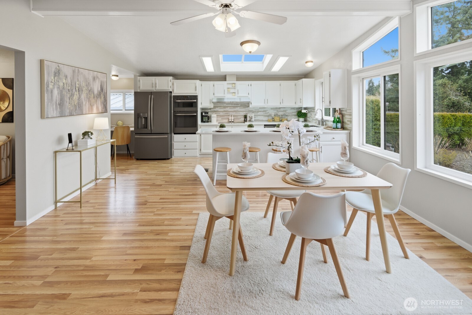 Discover unparalleled luxury in this beautifully updated home located in Everett’s coveted Fairway Estates, a premier 55+ gated community. This home features unparalleled luxury w/high-end finishes & details that will delight. Enter to vaulted ceilings & lrg windows that create a bright ambiance while the open floor plan showcases all this home offers. Both Living Rm & Family Rm feature a spacious layout perfect for everyday living & entertaining. Chef-inspired updated kitchen w/quartz counters, smudge resistant appliances, convection oven & microwave, lrg bar, pull-out organizers, 2 pantries & built-in coffee bar. Luxurious 15x16 primary w/lrg walk-in closet & updated spa-like ensuite w/dual sinks & lrg shower. Additional features include: custom 3-room workshop, entertainment-size deck, above ground planters, heat pump/AC, and beautiful views of the golf course. Enjoy Fairway’s clubhouse, fitness center & walking its park-like grounds. Prime location next to Walter Hall Golf Course & close to dining, shopping, medical & transit. Welcome home!