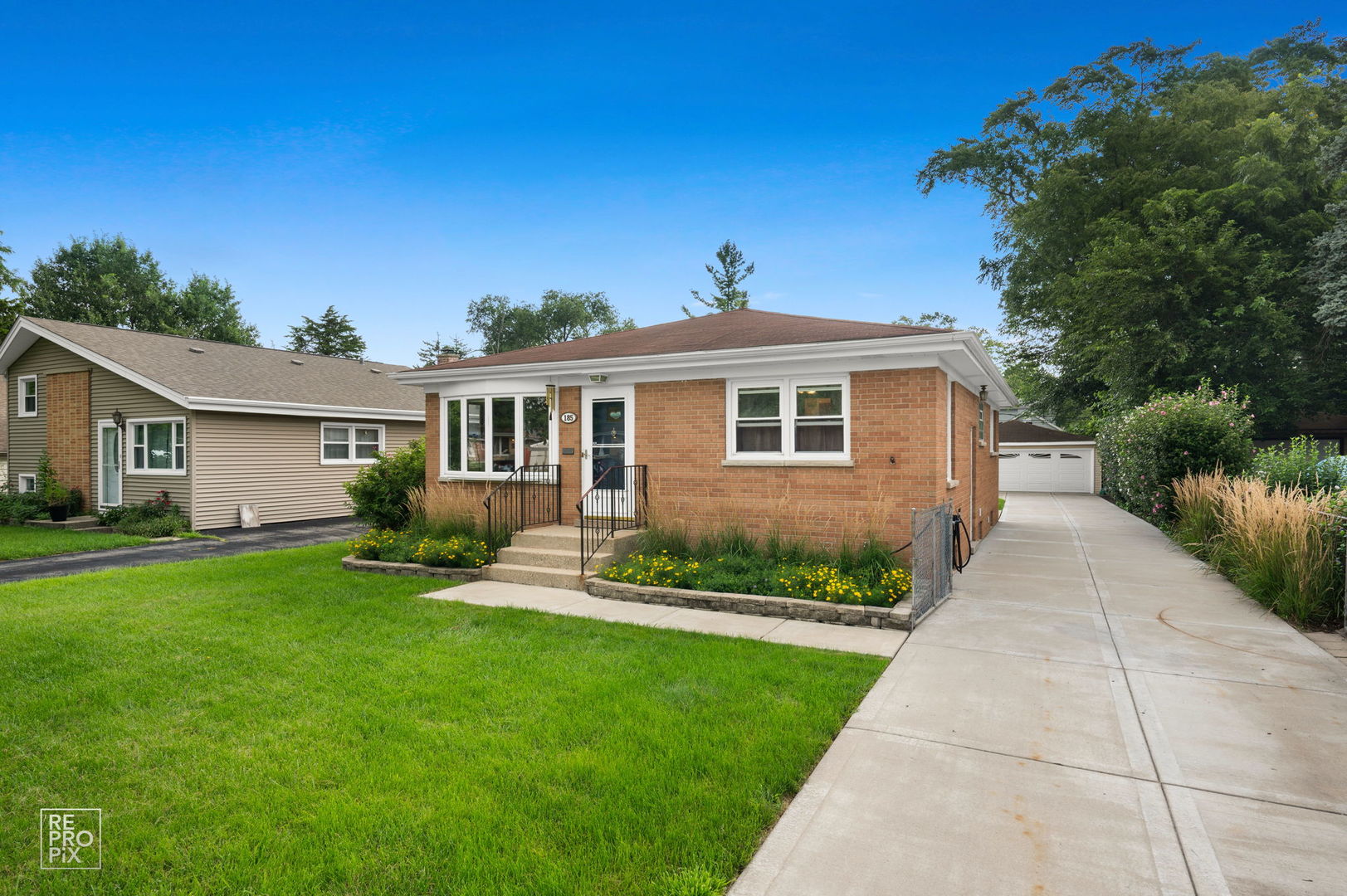 You will fall in love with this clean and solid brick ranch, ideally located in the heart of Bensenville! This charming 3-bedroom, 2-full-bath home offers comfortable living space, thoughtful updates, and a convenient location.  The main level features a bright and inviting living room with a beautiful bow window, a functional eat-in kitchen with quartz countertops and stainless steel appliances, and three comfortably sized bedrooms. The full basement provides even more living space, including a recreation area, second full bathroom, laundry area, and plenty of room for storage.  Step outside to enjoy the oversized 2.5-car garage, newer concrete driveway with ample parking, concrete patio, and fully fenced yard-perfect for pets, children, entertaining, or simply relaxing outdoors.  Recent updates include a concrete driveway (2010), furnace (2013), air conditioning (2012), water heater (2014), and roof (approximately 2014).  Location is another highlight! Sunset Park is just two doors away, while the Metra station, shopping, and popular Bensenville restaurants are all within walking distance. The home is also conveniently located near schools, the Park District Recreation Center and Pool, and O'Hare International Airport.  With its solid brick construction, flexible living space, spacious yard, and unbeatable location, this home offers the perfect combination of comfort, convenience, and value. Come see it for yourself-you may just fall in love!