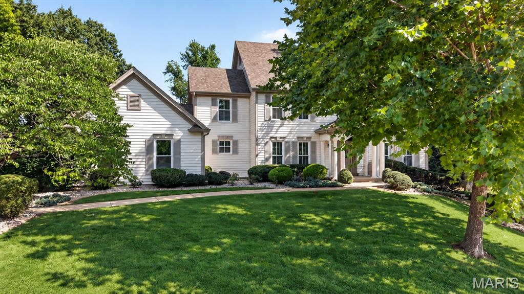 Five bedroom Wildhorse Village home on a level cul-de-sac lot in award-winning Rockwood School District! The main-level kitchen & breakfast room open directly to the large paver patio, while the finished walk-out lower level also provides backyard access—an uncommon combination for easy indoor-outdoor living.The level, private backyard boasts a wooded view, mature trees, open green space, the perfect sledding hill & room to create the resort style pool setting you have been envisioning. Main level features 9-foot ceilings, granite countertops, a center island, walk-in pantry, bay windows and a brick-to-ceiling wood-burning fireplace. The finished walk-out lower level includes a family room, recreation space, mini-kitchen, fifth bedroom, office/sleeping room and full bath—ideal for guests, work-from-home needs or multigenerational living. Upstairs are the vaulted primary suite with dual walk-in closets and updated bath, plus three additional bedrooms served by two full baths, including a Jack-and-Jill and ensuite.Best of all, the expensive—but not-so-exciting—stuff is already done! Major improvements include: NEW roof, NEW windows, NEW front door, NEW plantation shutters, NEW HVAC, FRESH paint throughout main & lower levels, NEW light fixtures & NEW lower-level carpet. All that’s left for you is the fun part—move in, decorate, and make it your own!Walk to Chesterfield Elementary and enjoy Wildhorse Village amenities: three pools, clubhouses, tennis/pickleball courts, trails, lakes, fishing, and sidewalks- all within one of the area’s most sought-after and established communities off prestigious Wild Horse Creek Rd. This is where space, location, and lifestyle come together just minutes from major highways.