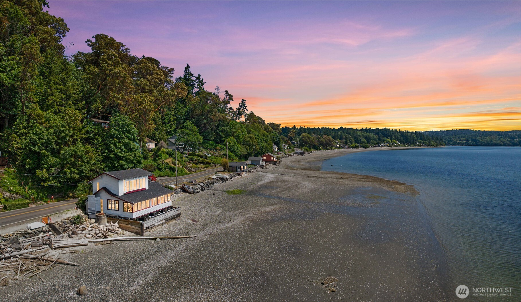 Come and relax on this private water front property nestled on Burton beach with 180 degree views of Quartermaster Harbor. A short 15 min Fauntleroy/Vashon ferry ride transports you to this tranquil beach cabin on a 100 feet no bank waterfront. 1,120 sq ft filled with natural light and large windows 1 bedroom, 1.5 bathroom, A/C split unit and bonus room can be office, yoga, or art studio.  Property sits on large lot with property line to back hill side. Endless potential to make this home your own.