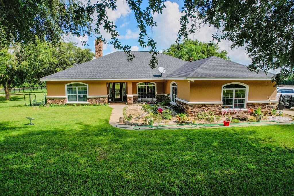 A WORLD UNTO ITSELF, DRIVE THRU PRIVATE ELECTRIC GATE ON TO PRIVATE ROAD THAT LEADS TO MODERN THREE BEDROOM, TWO BATH,TWO CAR GARAGE,POOL HOME WITH 2067 SQUARE FT. LIVING AREA. LOCATED ON 8.35 ACRES OF BEAUTIFUL ROLLING PASTURE LAND IN THE ROMEO AREA OF DUNNELLON. FENCED AND CROSS FENCED READY FOR YOUR FARM ANIMALS, WITH TWO STALL HORSE BARN, 20 X 50 METAL BUILDING WORKSHOP, 50 AMP RV PLUG ADDED TO EXTERIOR SHOP. LARGE SCREEN ENCLOSED SALT WATER POOL WITH WATER FALL, GAS FIREPLACE IN THE LIVING ROOM, GENERAC GENERATOR WITH 500 GALLON PROPANE GAS TANK, NEW ROOF 2022, WHOLE HOUSE WATER SOFTNER. ROMEO ELEMENTARY SCHOOL IS WITHIN THREE MILES OF HOME, THE WORLD EQUESTRIAN CENTER IS WITHIN FIFTEEN MINUTES FROM THE HOME. DOWNTOWN DUNNELLON TEN MINUTES. GREAT LOCATION. COME SEE THIS HOME TODAY.