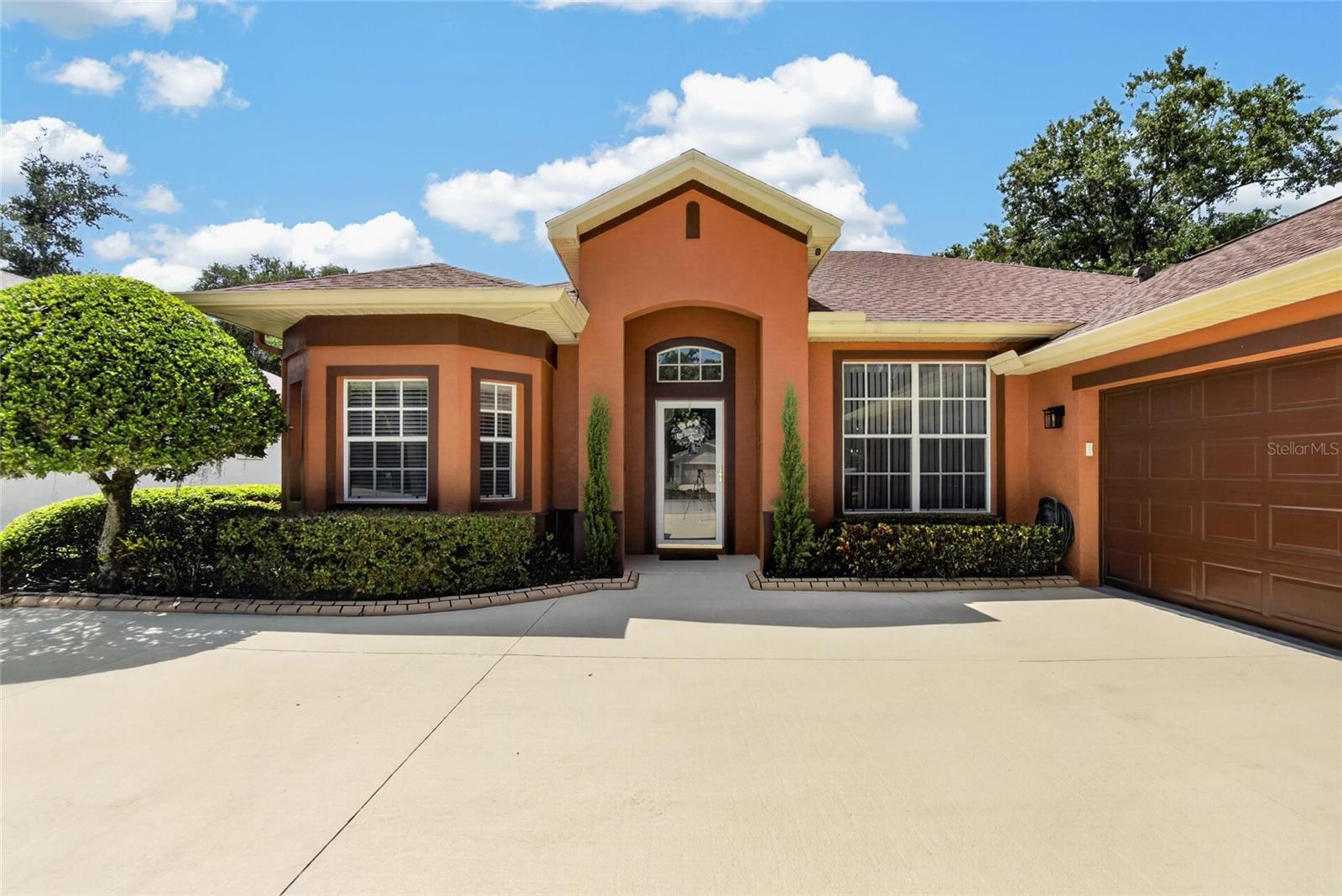 Under contract-accepting backup offers. Welcome to your dream home in the Spring Meadow Neighborhood of Walden Lake! This meticulously maintained Hamilton Great Room model is completely move-in ready and bursting with upgrades. From the moment you arrive, the exceptional curb appeal captivates you with custom concrete landscape curbing and dramatic exterior lighting.Step inside to a grand, open-concept floor plan elevated by high stepped ceilings, elegant wainscoting, and gorgeous Brazilian cherry hardwood floors. The kitchen features granite countertops, an undermount sink, and a pantry, all while overlooking the expansive great room—perfect for entertaining. Near the foyer, a large, dedicated home office boasts crown molding and matching Brazilian cherry wood floors.The luxurious Primary Bedroom Suite serves as a private retreat, complete with a tray ceiling, direct lanai access, and double walk-in closets. Its spa-like ensuite bath features a custom double-sink vanity with granite countertop, a separate shower, and a relaxing jetted soaking tub. Two additional ample-sized bedrooms share a well-appointed hall bath on the opposite side of the home.Your backyard oasis awaits! Spend endless hours lounging by the pristine pool and screened lanai. The pool area comes fully equipped with a new LED light, a dual-speed Pentair pump (2023), and an included Dolphin electric pool vacuum. Enjoy ultimate peace of mind thanks to a fully fenced yard, a Vivint alarm system, and an Arlo camera setup. Key Features & Updates: AC: New (May 2023), Pool Pump: Pentair Dual-Speed (2023), Roof: Premium Hybrid Shingles (2017)Walden Lake offers an unparalleled lifestyle with miles of walking and biking trails, a lakefront park, large and small dog parks, and a sports complex featuring baseball field and volleyball court. Located in historic Plant City, you will enjoy a vibrant downtown scene and effortless commuting with quick access to both I-4 and I-75. Schedule your tour today!