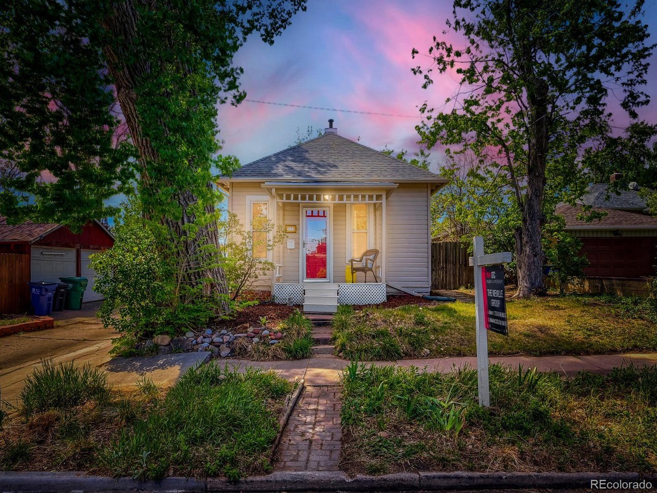 Discover this Sunnyside charmer - a cozy corner-lot home wrapped in mature trees and classic Denver character. Inside, you'll find original hardwood floors, fresh paint inside and out, and a beautifully remodeled bathroom that brings modern comfort to this historic gem. The outdoor spaces shine with new landscaping and a new side fence, creating a private retreat that lives larger than its footprint. All of this just a short walk to Highlands' favorite restaurants and minutes from downtown Denver. Small in size, big on charm - this one is easy to fall for.