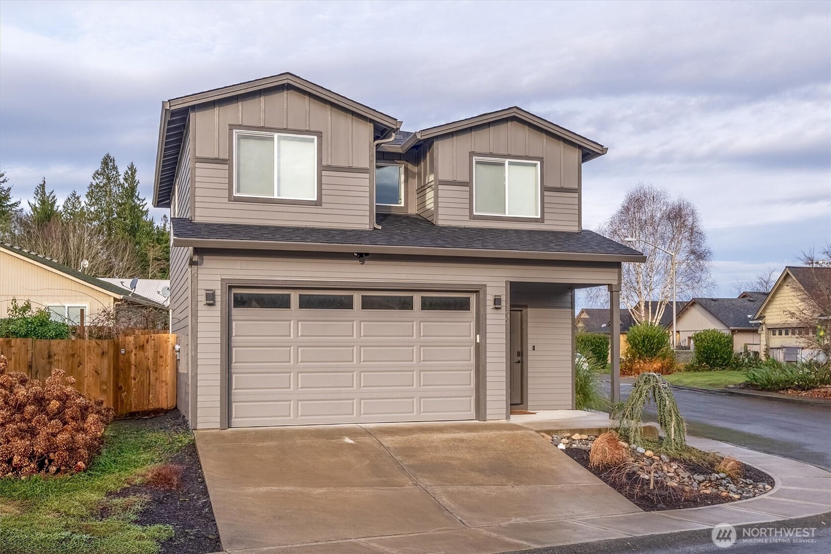 Cathlamet home built in 2022, situated on a corner homesite with 9-foot ceilings and modern finishes throughout. The main floor offers durable LVP flooring and a spacious kitchen with quartz countertops, a farm sink, soft-close cabinetry, stainless steel appliances, a range with a built-in microwave, and a walk-in pantry. Upstairs, the large primary bedroom includes a walk-in closet and a private bath with double undermount sinks, quartz counters, and a tub/shower combination. Two additional bedrooms, a full bath with modern fixtures, and a convenient upstairs utility room complete the upper level. Smart home features include an Ecobee thermostat, smart lighting and switches, Yale keyless entry, and a Ring doorbell. Outside, the fully fenced backyard features a patio with 6-foot fencing and offers an open canvas for gardening, outdoor projects, or creating a space that fits your lifestyle. The home is just minutes from downtown amenities, including parks, schools, a brewery, and the marina river walk. "Seller offering up to $12,000 toward buyer closing costs and/or interest rate buy-down.”