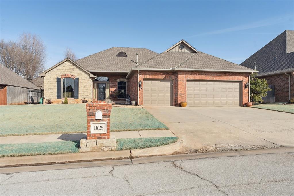 Positioned in an ideal Edmond location the neighborhood is across from the popular Mitch Park, loads of shopping, restaurants, and the community has a sparkling pool, greenbelts and sidewalks for your evening stroll. This beautiful home with fantastic curb appeal was built by Don Chesser Homes and exudes quality throughout. Within this thoughtfully designed MIL plan, the 3 bedrooms are large and all have access to a full bath. The handsome study has wood floors and a built-in desk/book shelves. The living room is warm and inviting perfect for family gatherings around the gas logged FP. The formal dining is large enough for your large table & hutch ideal for the holidays. The kitchen boasts gorgeous granite countertops with a convenient breakfast bar, an eating area, a pantry, stainless steel appliances(the range is gas!) and a center island perfect for gourmet in you household. The master is huge with a sitting area, a door to the back patio, the bath has double vanities, a jetted tub and large walk in closet. The secondary beds share a Jack & Jill bath w/a tub/shower combo and one of the beds has a mammoth walk-in closet. The 3 car garage presents extensive accommodation for vehicles, alongside generous capacity for storage or the pursuit of various interests and an in-ground storm shelter. There are $38K worth of new Anderson windows which will certainly aid in your utility bills! Roof new in 2014/gutter guards over patio, The H&A was new in 2017. This property stands as an exceptional opportunity to embrace a life of comfort and convenience in a sought-after locale. Hurry to see it for yourself!