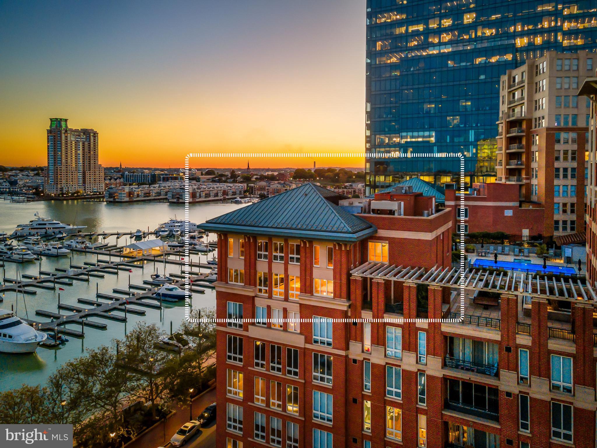 Spinnaker Bay Penthouse 802 | Harbor East | Unmatched Luxury | Unrivaled Value. Experience true penthouse living in this one-of-a-kind 3-bedroom, 3.5-bath residence spanning over 5,000 sq ft across two dramatic levels. Perched atop Spinnaker Bay with no shared walls, this home offers the privacy and scale of a standalone residence with the convenience of one of Harbor East’s most coveted addresses. Step from your private elevator into a marble foyer showcasing a custom stainless-steel staircase and sweeping views of the Inner Harbor and city skyline. The main level features an open-concept living, dining, and chef’s kitchen equipped with Sub-Zero and Wolf appliances, maple cabinetry, and an oversized island—perfect for entertaining. Enjoy al-fresco dining on your private terrace or movie nights in the dedicated home theater. Upstairs, the primary suite is a private retreat with panoramic water views, a gas fireplace, a sitting area, custom walnut closets, and a spa-inspired bath with a jetted tub, a rain shower, and color-changing ambient lighting. Two additional ensuite bedrooms, a raised home office, and designer lighting throughout complete this remarkable residence. Outdoor living continues with a garden-level terrace and lighted pergola, ideal for evening gatherings. Additional highlights include whole-home Lutron lighting, 8-zone audio, 3 secure garage spaces, and a private storage room. Live steps from Baltimore’s best dining, shopping, and waterfront amenities—at a value no other Harbor East property can match.