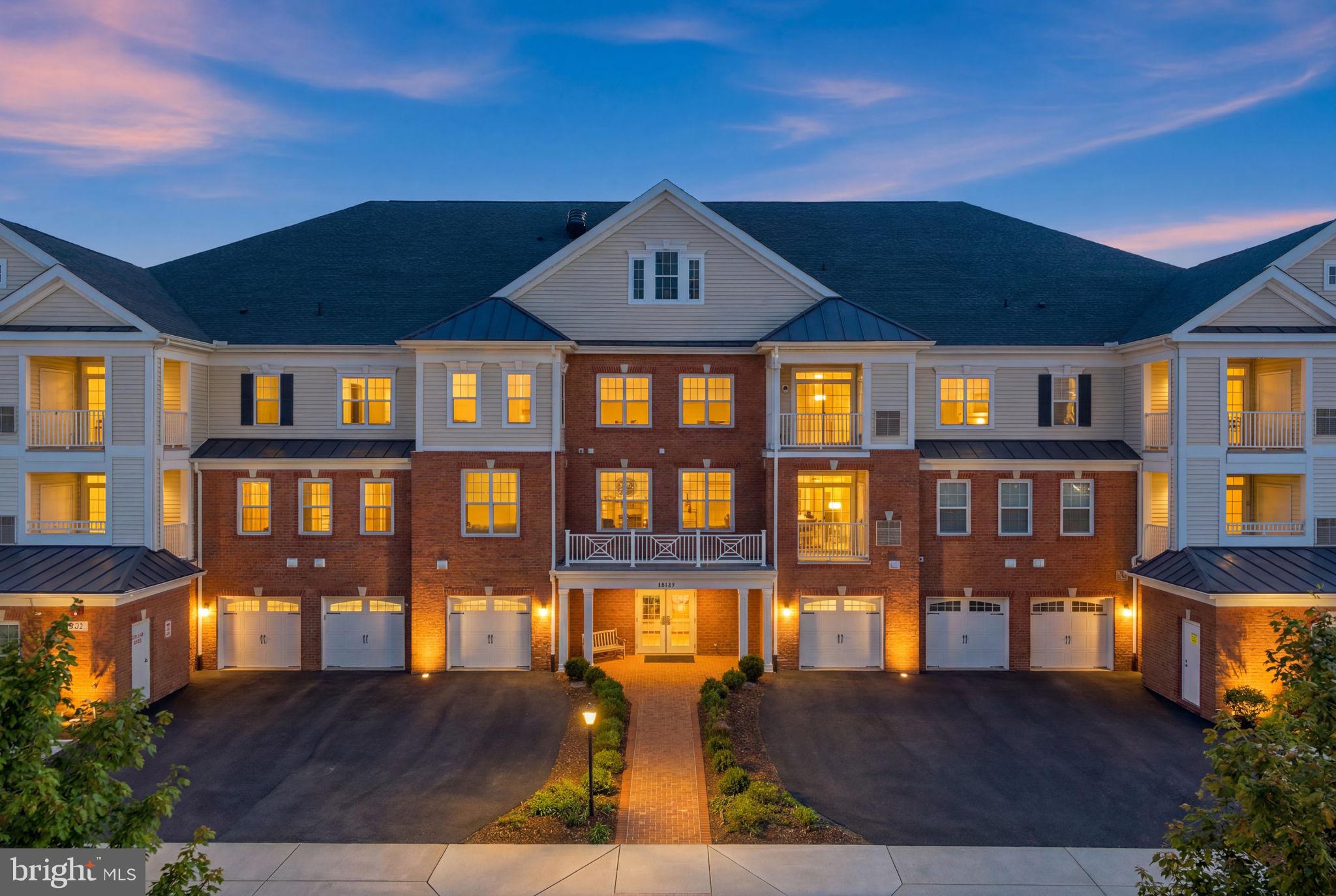 Refined living awaits in this amenity-rich gated community, conveniently located near One Loudoun and in the heart of Ashburn Village! This beautifully appointed 2-bedroom, 2-bath condominium features generously sized spaces, a private balcony, and a coveted one-car garage. Secure parking and abundant guest parking are available throughout the community. Impeccably maintained, the residence strikes a rare balance of elegance and comfort, with gracious proportions and an inviting sense of openness throughout.Situated in the vibrant Regency at Ashburn Greenbriar 55+ community, this home places every convenience at your doorstep. Residents enjoy a beautiful on-site clubhouse with a fitness center, club rooms, kitchen, outdoor pool, fire pit, and putting green, as well as miles of walking and biking trails. Fish in the ponds, observe wildlife in the Beaverdam Creek wetlands, and enjoy full privileges at Ashburn Village and the Ashburn Village Sports Pavilion, where you can play winter tennis in the AVSP tennis bubble or enjoy Pickleball.If relaxation is your preference, you can simply lounge by the pool or play mahjong or bridge with friends—the opportunities to socialize are endless. Each condo unit includes a one-car garage to keep your car cool in the summer and heated to keep it free of ice and snow in the winter. Take the elevator to the garage level to avoid rain or bad weather.  Mailboxes are conveniently located near the entrance. However,  the lobby and elevator can only be accessed with an entrance code, for your security.The open floor plan features a spacious kitchen connected to the dining area and living room. Beautiful wood flooring extends through the kitchen, living room, dining room, foyer, and hallways. The kitchen is ideal for entertaining, with a large island, granite countertops, space for barstools, stainless steel appliances, a pantry, abundant cabinetry, and a gas stove for those who love to cook. A variety of nearby restaurants are also just minutes away. Off the living room, a balcony offers a wooded view—perfect for enjoying meals or coffee in nature.The owner’s suite accommodates a king-sized bed and sitting area, with a huge walk-in closet, custom closet, and en-suite bath featuring granite countertops, an oversized shower, a large linen closet, and tile flooring. A secondary bedroom is located on the opposite side of the living room, adjacent to a hall bath and laundry room with full-sized washer and dryer included. The hall bath also features granite countertops and tile flooring. The secondary bedroom can serve as a guest room or home office. Pets are welcome in the community, making this condo ideal if downsizing. This condo has quite a lot of closet space as well as the garage for extra storage. There is a keypad on the door so you don’t need to find your keys to go in and out.All of this is conveniently close to grocery and retail shopping, dining, golf, trails, major commuter routes, and public transportation, including the metro—perfect for trips to airports, ballgames, museums, shows, or the Kennedy Center in Washington, D.C.This home offers everyday convenience in a well-planned, established community.