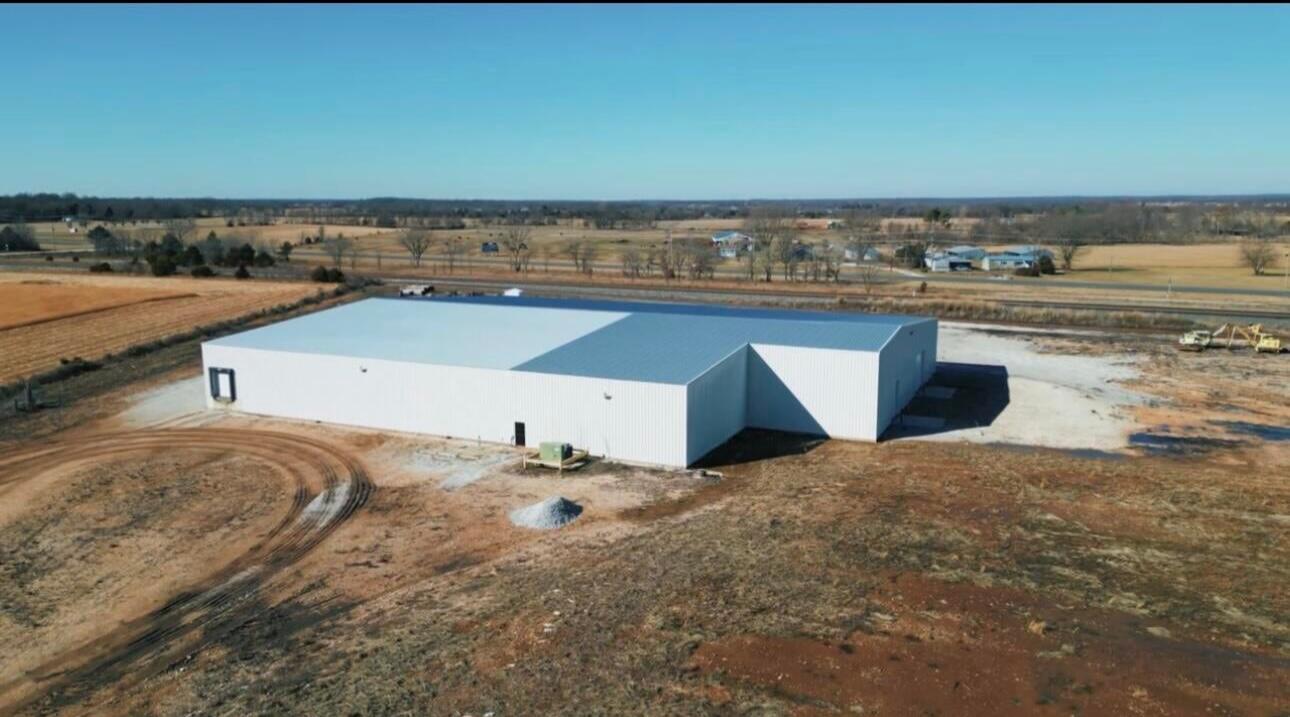 ~OPPORTUNITY ZONE & FOREIGN TRADE ZONE ~LOCATED ON HWY 59 NEAR NEOSHO AIRPORT ~EASY ACCESS TO I-49 & 22 MILES TO I-44 ~40,000 SQ FT WAREHOUSE, FULLY RENOVATED IN 2021 WITH 100% CONCRETE FLOOR, 1 DOCK DOOR WITH LEVELER, 3 DRIVE-IN BAYS WITH 14'X16' GARAGE DOORS, 24' SIDE WALL HEIGHT, 2 WALK IN DOORS WITH RESTROOMS AND OFFICE AREA POTENTIAL ~7.38+/- ACRES WITH NO KNOWN RESTRICTIONS ~50,000 SQ FT PAD READY TO BUILD ON FOR EXPANSION~3 PHASE POWER IN 2SEPARATE AREAS ~LARGE WATER WELL WITH 3 PHASE PUMP ~2 SEPTICS ~1,344 SQ FT OFFICE BUILDING OR RESIDENCE ~FIBER INTERNET ~CENTRALLY LOCATED IN THE MIDDLE OF THE US WITH POSSIBLE CLASS 1 RAIL ACCESS