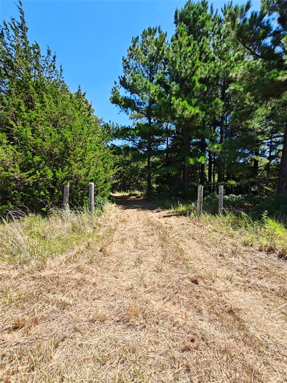 Peaceful 10 acres right off 120th avenue in Norman. Property is already fenced with a gate, has a well, and electric. Property is near Lake Thunderbird and is approximately 20 minutes from downtown Norman. You couldn't ask for a better location!