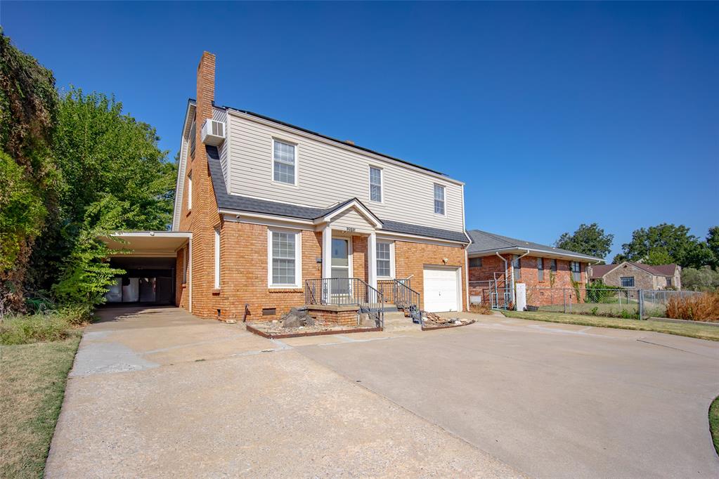 CHARMING, Updated home across from Denniston Park! Solar panels are owned & offer extremely low electric bills! Plus a backup generator for reassurance! Beautiful wooden floors (appears they are also under carpet upstairs). Remodeled kitchen w/ SS Appliances & Granite countertops. Homey 2nd living w/ fireplace & rock hearth. Additional insulation added to walls & attic, allow for a comfortable upstairs. Roof is appx 1 Yr old. Abundant storage w/ multiple sheds out back, perfect for your hobbies! Minutes from OCU & everything 23rd St. has to offer!