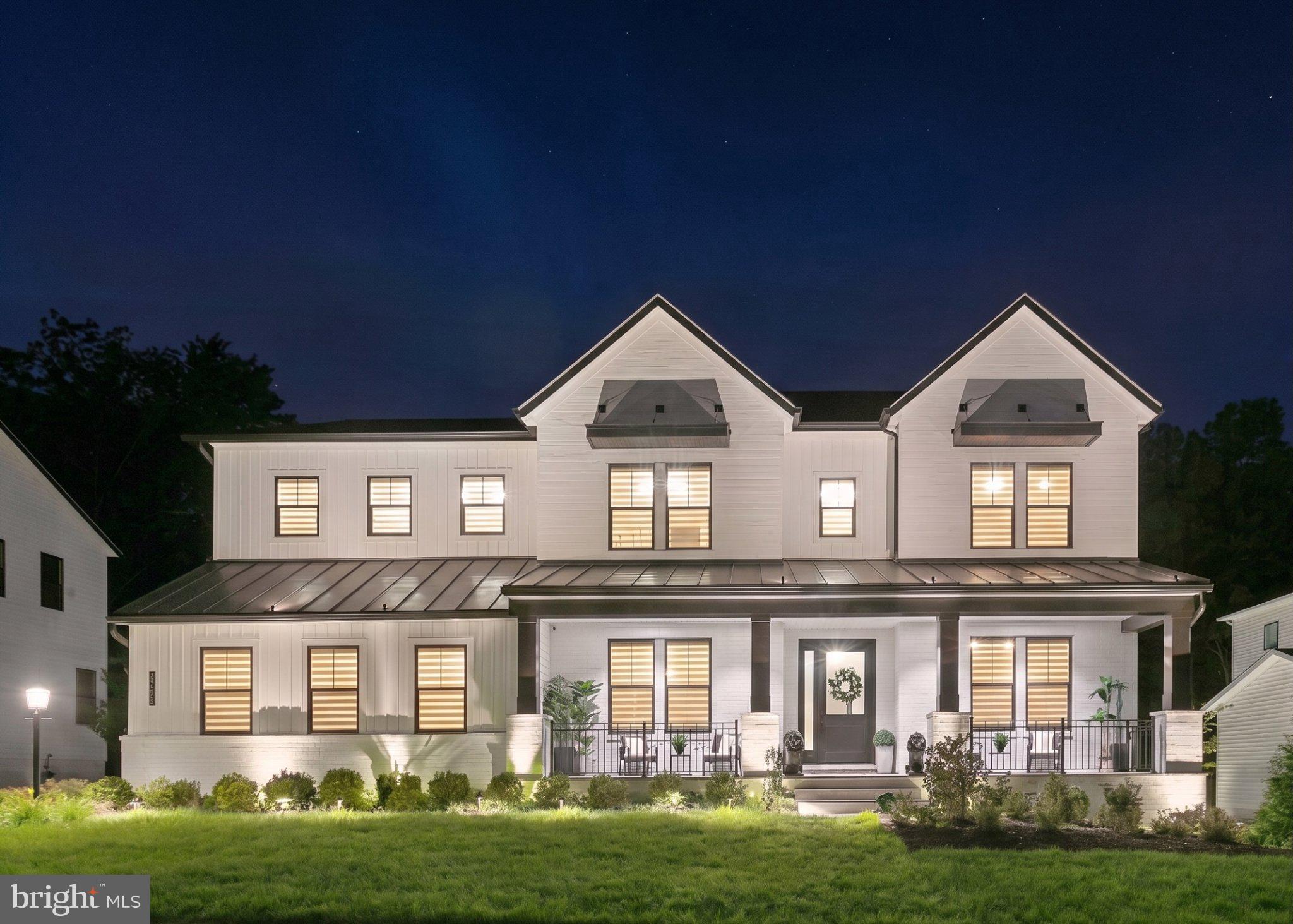 There are homes that check every box, and then there are homes that make you pause the moment you walk through the front door.Nestled in one of Lenah Mill's most desirable settings, this exceptional 7,228-square-foot Toll Brothers Palisades/Passant residence combines timeless modern farmhouse architecture, thoughtful craftsmanship, and luxurious everyday living. Backing to a protected wooded preserve that can never be developed, the home offers a rare blend of privacy, natural beauty, and refined design.Inside, a dramatic two-story great room serves as the heart of the home, anchored by one of three impressive 60-inch gas fireplaces and filled with natural light. Expansive glass sliding doors create a seamless connection to the covered outdoor living room with fireplace, overlooking tranquil woodland views and creating an effortless indoor-outdoor lifestyle.The gourmet kitchen is designed for both everyday living and entertaining, featuring an oversized island, a complete Jenn Air appliance package, double ovens, a built-in refrigerator, a secondary refrigerator, abundant cabinetry, and direct access to the expansive breakfast area designed for memorable gatherings. Multiple French glass doors throughout the home add architectural character while enhancing the flow of natural light.Custom built-ins in the mudroom, breakfast area, primary suite, and laundry room provide exceptional functionality and craftsmanship. Modern designer lighting, recessed lighting, wide-plank flooring throughout the main and upper levels, and thoughtfully curated finishes create a warm and sophisticated atmosphere throughout the residence.Additional highlights include a private home office, dedicated media room, integrated Sonos audio system, built-in Wi-Fi enhancements throughout the home, whole-house water filtration system, EV charging capability, automated sprinkler system, outdoor architectural and focus lighting, Zebra blinds, and ceiling fans throughout.Set within one of Loudoun County's most sought-after communities, this is more than a home. Framed by a striking black-and-white modern farmhouse exterior and surrounded by the beauty of a protected wooded preserve—this home was designed for the moments that matter most.PROPERTY HIGHLIGHTS• Toll Brothers Palisades model• 7,228 square feet of living space• Modern farmhouse exterior with black-and-white elevation• Backs to protected wooded preserve (cannot be developed)• Two-story great room• Three 60-inch gas fireplace• 10 FT Ceilings in Main Level• Covered outdoor living room with 60-inch gas fireplace• Multiple French glass doors• Wide-plank flooring throughout main and upper levels• Dedicated home office• Dedicated Media room• Custom built-ins in mudroom• Custom built-ins in the breakfast area• Custom built-ins in primary suite• Custom built-ins in laundry room• Modern designer lighting throughout• Recessed lighting throughout• Ceiling fans in all roomsKITCHEN & ENTERTAINING• Dedicated Main Kitchen• Dedicated Prep Kitchen • Complete Jenn Air appliance package • Built-in Jenn Air refrigerator • Secondary refrigerator • Double Jenn Air Dishwashers• Double Jenn Air ovens  • Oversized center island • Abundant cabinetry • Expansive breakfast area designed for large gatheringsTECHNOLOGY & COMFORT• Whole-home Sonos audio system• Sonos speakers in multiple living areas, basement, kitchen, outdoor living space, and primary bath• Built-in Wi-Fi extenders throughout the home• Zebra blinds throughout• Water filtration system• EV chargerEXTERIOR & LANDSCAPING• Covered outdoor living room• Protected wooded preserve views• Automated sprinkler system• Electric automated outdoor architectural, landscaping and focus lighting• Professionally landscaped setting• Welcoming front porch