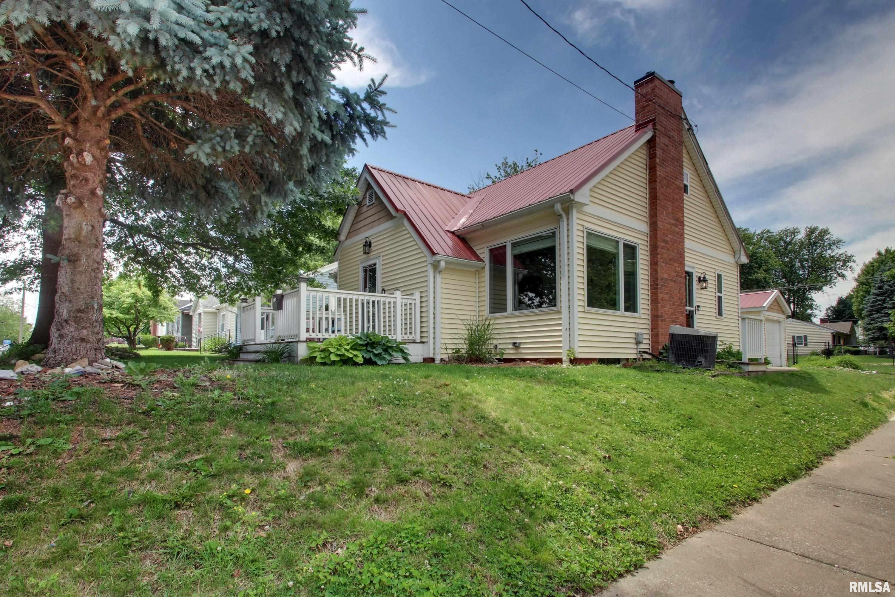 Don't miss your opportunity to see this charming home located in a beautiful south side location that is close to so much.  This home offers three bedrooms with the option of fourth non conforming bedroom in the basement.  With many upgrades and updates all that is left is to move in.  The metal roof provides peace of mind and the water heater and dishwasher were both replaced in 2025.  The vinyl plank flooring in the living room, hallway, basement office and stairs going up was all added in 2023 as was new carpet in all three bedrooms.  The kitchen was fully remodeled in 2020 and the bathroom in 2018. The large fenced in backyard offers lots of space for furry friends.  The detached garage and driveway is off Jackson Street so easy access.  There is additional off street parking in the alley at the rear of the yard. This home is a great value, call and schedule your showing today!
