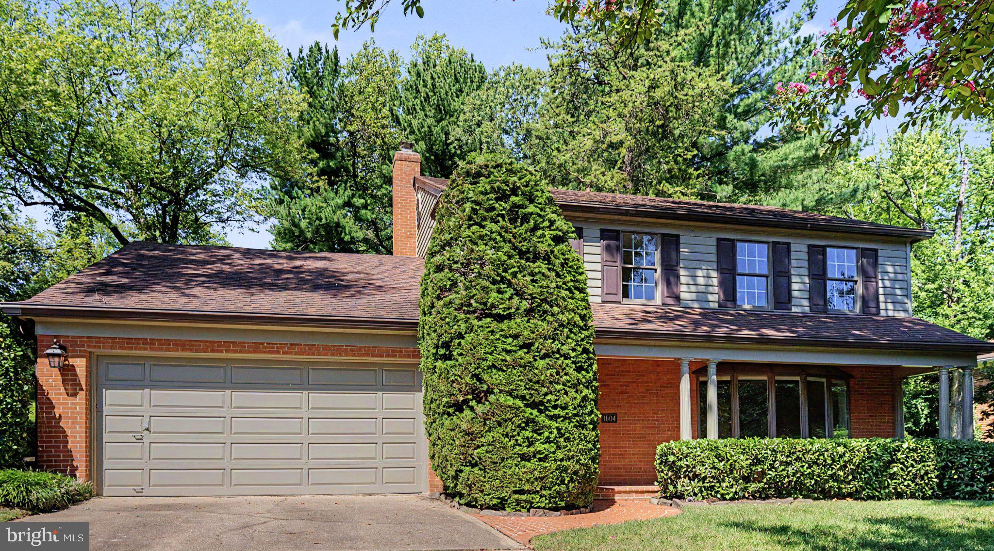 Welcome to 1604 East Avenue, a beautifully maintained 4-bedroom, 2.5-bath home with a 2-car garage, ideally situated on a quiet McLean cul-de-sac and lovingly cared for by its original owner since purchasing it from renowned local builder Frank J. Murphy. Freshly painted in 2026, the home combines timeless architectural details with inviting living spaces, hardwood floors, solid wood doors, and a beautifully landscaped private backyard. The main level offers an easy flow for everyday living and entertaining, with crown molding, wainscoting, and abundant natural light throughout. The spacious family room is a standout, featuring two skylights, a gas fireplace with marble surround, built-in shelving and cabinetry, and sliding doors opening to the backyard. Formal living and dining rooms provide additional gathering space, while bay and bow windows add warmth and character. The kitchen offers generous cabinetry, under-cabinet lighting, stainless steel appliances, a center island with additional storage, pantry with pullout drawers, and a GE Profile double wall oven installed in 2025. An adjoining breakfast room surrounded by bow windows creates a bright spot for casual dining. Upstairs, the primary bedroom features a bay window and an organized closet, while the skylit primary bath includes a walk-in tiled shower with a built-in bench. Three additional bedrooms, a second full bath, and attic access provide excellent flexibility and storage. The lower level adds even more functionality with laundry, a workbench, utility sink, storage cabinets and shelving, and walk-up access to the backyard. Outside, enjoy a large brick patio, retaining walls, mature landscaping, and a private setting ideal for relaxing or entertaining. Located in the sought-after Chesterbrook Elementary, Longfellow Middle, and McLean High School pyramid, the home is approximately 0.4 miles from Linway Terrace Park, 0.9 miles from Chesterbrook Shopping Center, and 1.5 miles from downtown McLean. Nearby recreation, trails, shopping and dining complement convenient access to Chain Bridge, East Falls Church Metro, Tysons, Reagan National Airport, and Dulles International Airport. 1604 East Avenue offers the privacy of a cul-de-sac, access to nature and trails, classic architectural charm, and outstanding proximity to everything McLean has to offer.
