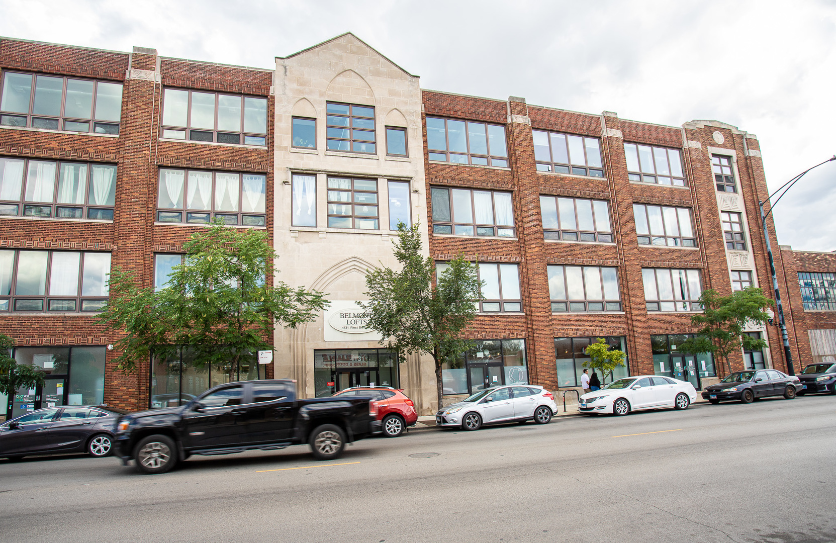 Welcome to Belmont Lofts! Discover this stunning top-floor loft in the HOT Avondale neighborhood, where style meets convenience. This incredible residence features soaring 12-foot ceilings and breathtaking floor-to-ceiling windows, offering southern exposure and inviting city views from your private balcony. Nestled in a sought-after elevator building, this light-filled condo showcases meticulous maintenance and a beautifully updated kitchen. With a smart, open layout, you'll enjoy the comfort of 1 bedroom and 1 bath, complemented by a modern kitchen that boasts newer stainless steel appliances and a pantry closet! The convenience of in-unit laundry with a newer washer and dryer, along with sleek LVT floors, adds to the appeal. The enormous primary bedroom is a true retreat, featuring a spacious walk-in closet and enviable natural light throughout, thanks to those high ceilings. Situated in a financially sound building, you'll appreciate the incredibly low assessments that make owning this condo a smart choice. Why rent when you can own and enjoy it all? This sophisticated layout is perfectly situated in the heart of the thriving Avondale neighborhood. Enjoy quick access to shopping, dining, and public transportation, with the Belmont bus stop right outside your door and the expressway just a mile away. The price includes one garage parking space, and the building offers fantastic amenities such as a workout room, additional storage, and a conference room. Plus, it's an investor-friendly building. Don't miss this opportunity-stop by before it's too late!