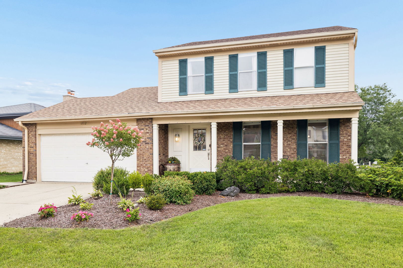 This beautifully remodeled two-story home is ready for you in the sought-after Dunham Place neighborhood. It is tucked away on a quiet cul-de-sac and offers nearly 2,500 square feet plus a full, unfinished basement! Thoughtfully renovated, this home features an expanded kitchen with elegant quartz countertops, neutral finishes, hardwood flooring, crown molding, and a primary suite with a fully remodeled bath and steam shower. The updated half bath and updated finishes throughout add to its appeal. Step outside to a stunning backyard retreat featuring a custom patio, with built-in gas grill, spacious entertaining area, and a high-quality trellis adorned with mature grapevines. This home offers the feel of newer construction in an established neighborhood. Ideally located in Downers Grove near major highways, shopping, dining, parks, and more-this home beautifully blends style, comfort, and convenience!