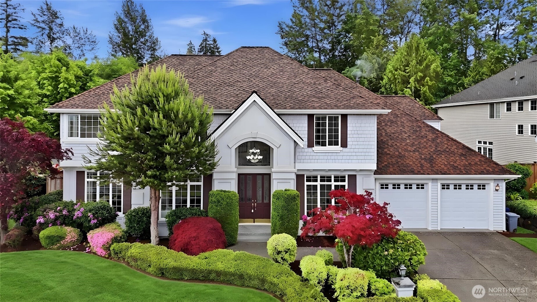 Elegant and beautifully maintained William Buchan model home resale, ideally situated on a desirable corner lot with views of Lake Sammamish. A dramatic two-story foyer welcomes you into a bright, gracious floor plan designed for comfortable everyday living and effortless entertaining. The home features central A/C, a spacious kitchen with rich cherry cabinetry, slab granite countertops, generous storage, and open flow to the main living areas. The highly desirable main level includes both a formal office and a guest bedroom, offering exceptional flexibility for working from home, multigenerational living, long-term guests, or a private retreat. Enjoy a dedicated media room, spacious bonus room, and an inviting primary suite with a relaxing sitting area. Additional highlights include a three-car garage, newer roof, new flooring, sprinkler system, and a beautifully landscaped yard that enhances both curb appeal and outdoor enjoyment. Located in the award-winning Issaquah School District with exceptional convenience to SR-520, I-90, Microsoft, East Lake Sammamish Trail, shopping, dining, parks, and everyday amenities. A rare opportunity combining timeless Buchan quality, thoughtful updates, lake views, and an unbeatable Eastside location.