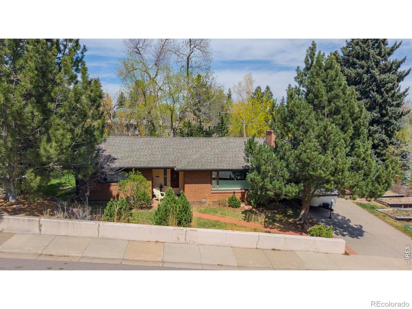 Live in your own private paradise. Ranch-style living at its best-just steps from the McClintock Trailhead leading directly into iconic Chautauqua Park.Set on nearly half an acre, this unique property is framed by a creek along the back, creating a backyard that lives like your own private park-lush, secluded, and incredibly peaceful. Mature landscaping and the natural setting offer a rare sense of privacy and tranquility in one of Boulder's most sought-after locations.The ranch-style layout offers easy, single-level living with a comfortable, welcoming feel. Move right in and enjoy, or bring your vision and elevate the home to match its exceptional setting-an opportunity that doesn't come along often in this location. Ideally situated with easy access to everyday conveniences, downtown Boulder, Denver, and the mountains, this home offers the perfect balance of retreat and connection.