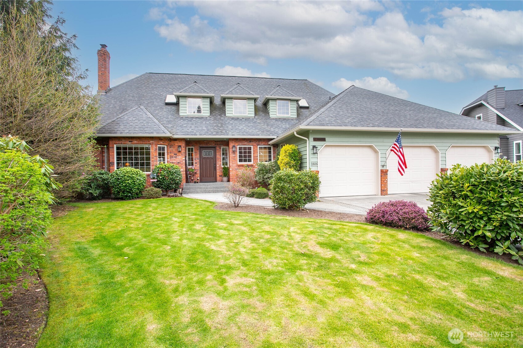 Remarkable one of a kind nearly 4,000 sq ft home in hidden gem Fairview west Lynden neighborhood. Very evident this home was built from the start with quality, attention to detail, and to LAST. From the beautiful brick and real wood exterior to the gorgeous refinished oak floors throughout the interior, it won't disappoint. Soaring two story foyer greets you with curved stairway leading to open upstairs hall. Enjoy relaxing in inviting cozy living room with gas fireplace surrounded by lovely brick including hearth - open to dining room yet clearly separate. Spacious kitchen with ample cabinets, upgraded stainless steel appliances, walk in pantry, granite & beautiful pastoral views. Great size family room w/access to huge custom trex deck tucked back off kitchen, perfect place to unwind. Owner's suite with sitting area, ensuite bath and large walk-in closet upstairs. Both upstairs bathrooms have been beautifully updated with tile flooring, quartz counters, new fixtures & a huge walk-in shower in the owner's ensuite. Excellent layout with 3 more great size bedrooms upstairs, office on main, and still plenty of room in basement! Basement has direct access to garage, giving great potential for separate suite with rough-ins, 3/4 bath, existing well windows and lots of room to make it your own. Complete w/3 car epoxy floor garage, AC, and never to be built behind in a nice quiet cul-de-sac. Incredibly well-maintained and ready for its new owners!