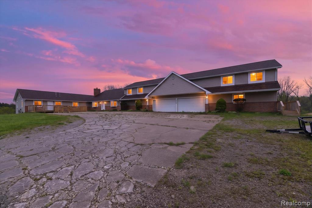 Welcome to this amazing, unique property nestled on ten rolling acres with a spring fed pond! Home features include brand new gorgeous kitchen with granite counters, new appliances, double sided fireplace to enjoy in the spacious main floor living areas, ten bedrooms, nine bathrooms, six car garage, finished walkout lower level offering over 3000 additional square feet of living space! Home is zoned residential and has tremendous potential for uses such as private retreat, bed & breakfast, rehab facility, residential facility, senior living, group home. Township approval would be needed for business use. This property is move-in ready and most furnishings are included.