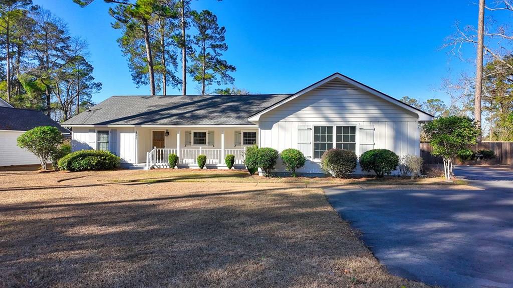 Move-in ready Immaculate home just minutes from everything Thomasville offers. Welcome home to comfort and convenience! This well-maintained 3-bedroom, 3-bath home is ideally located close to local schools in a quiet, convenient neighborhood. Inside, you'll find a spacious family room with a fireplace plus a separate den featuring a built-in bar—perfect for entertaining or relaxing at home. The kitchen offers warm butcher block countertops that add charm and character. You'll love the primary suite with large bedroom, double vanities, a tiled walk-in shower, and a spacious closet. Step outside to an adorable covered back porch and patio, ideal for enjoying the fully fenced backyard year-round. A fantastic opportunity in a desirable location and this home is like new!